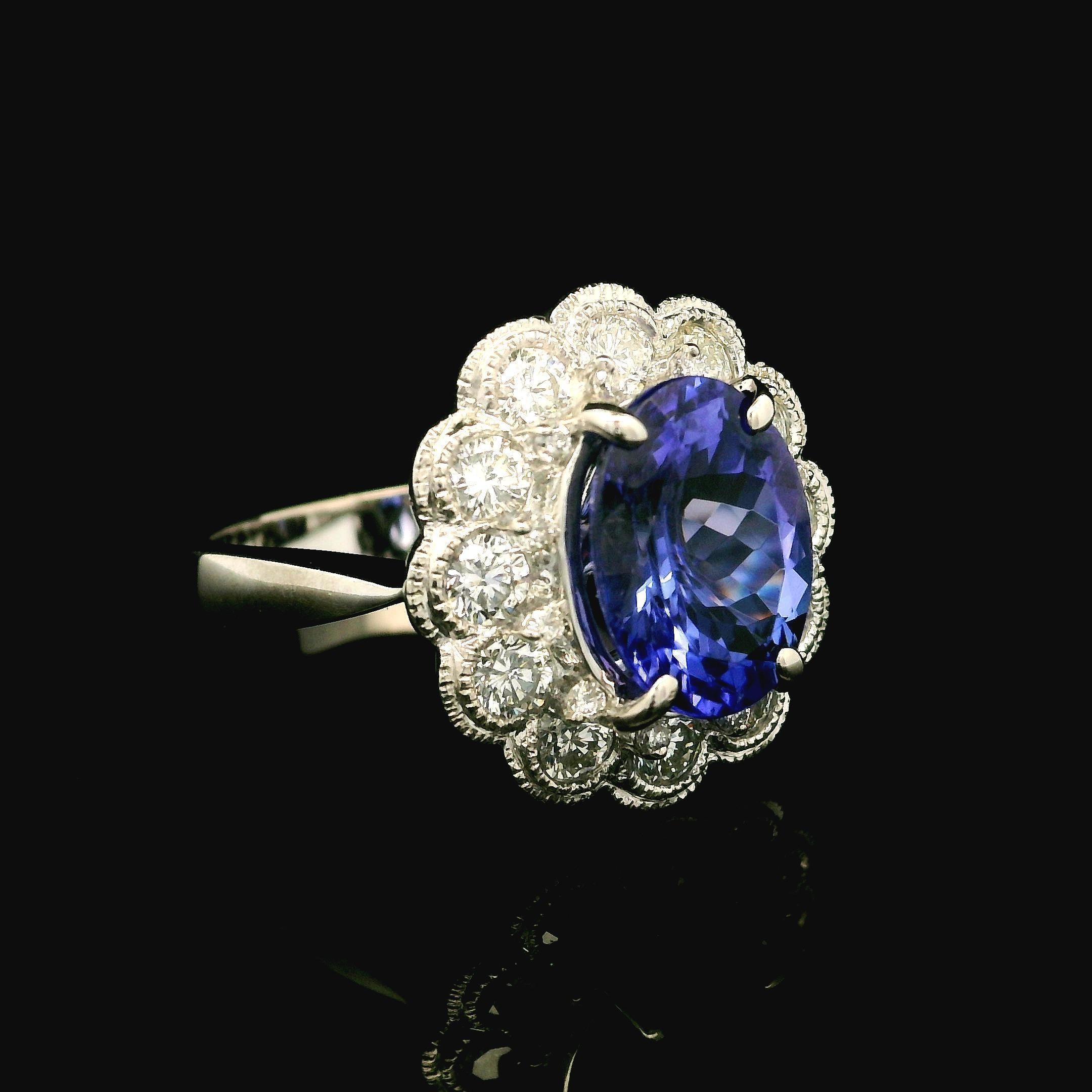 Women's 18k White Gold GIA 4.49ctw Tanzanite & Bezel Diamond Halo Cocktail Ring