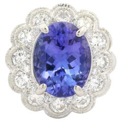 18k White Gold GIA 4.49ctw Tanzanite & Bezel Diamond Halo Cocktail Ring