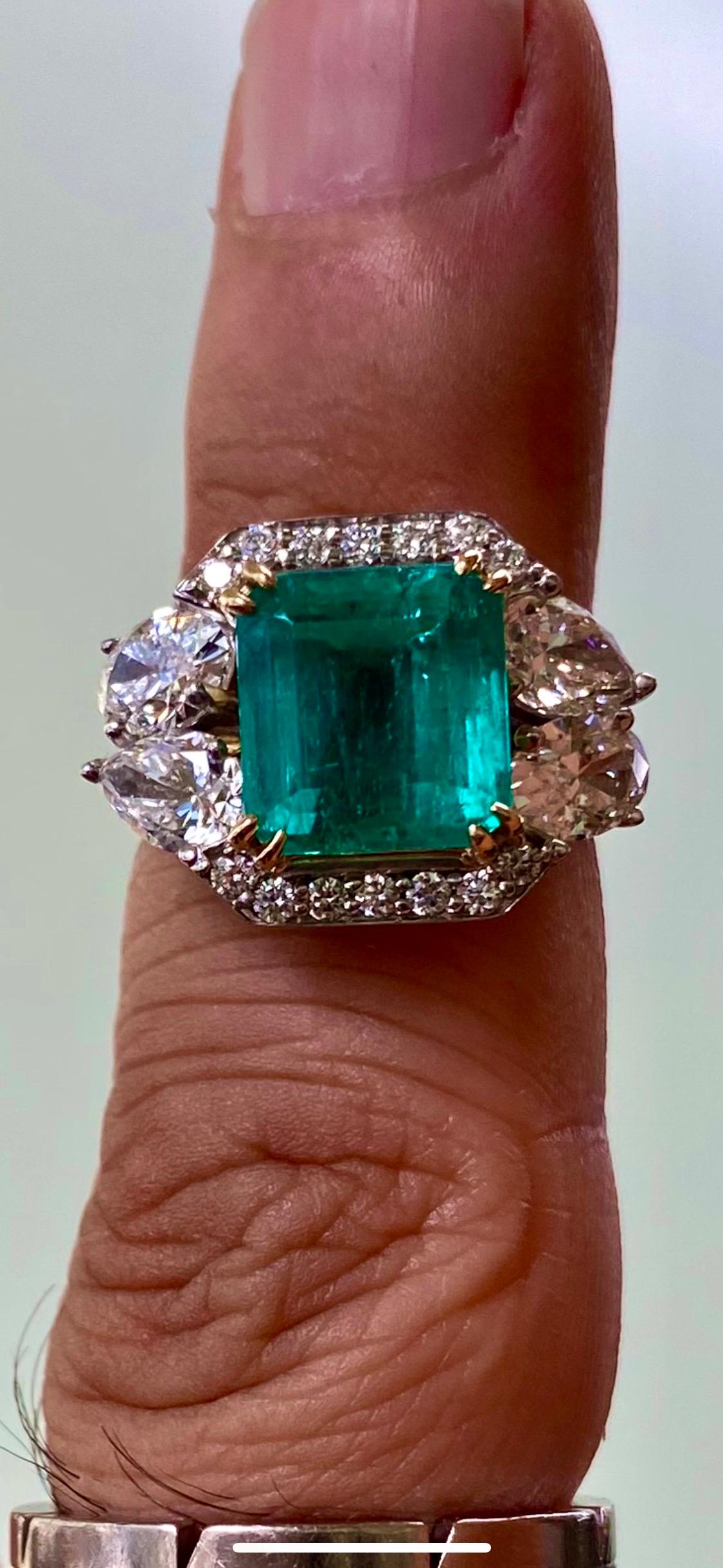 Dekara Designs Collection

Metal- 18K White Gold, 18K Yellow Gold, .750.

Stones- GIA Certified Colombian Emerald 4.87 Carats, GIA Certified Pear Shape Diamond H Color VVS1 Clarity 0.52 Carats, GIA Certified Pear Shape Diamond J Color VS2 Clarity
