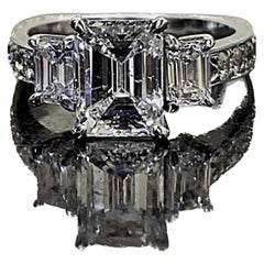18K White Gold GIA Certified Emerald Cut Diamond Three Stone Engagement Ring