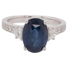 Anello con diamante naturale e zaffiro riscaldato certificato GIA