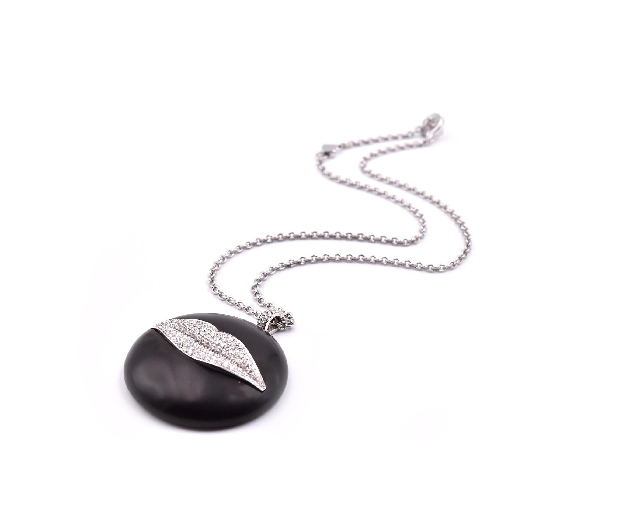 Designer: Gianni Bulgari
Material: 18k white gold 
Diamonds: 157 round brilliant= 2.25cttw
Color: G
Clarity: VS
Dimensions: necklace is 16-inches long and adjustable to 15-inches, pendant is 2-inches long and 45.63mm wide
Weight: 44.17 grams
