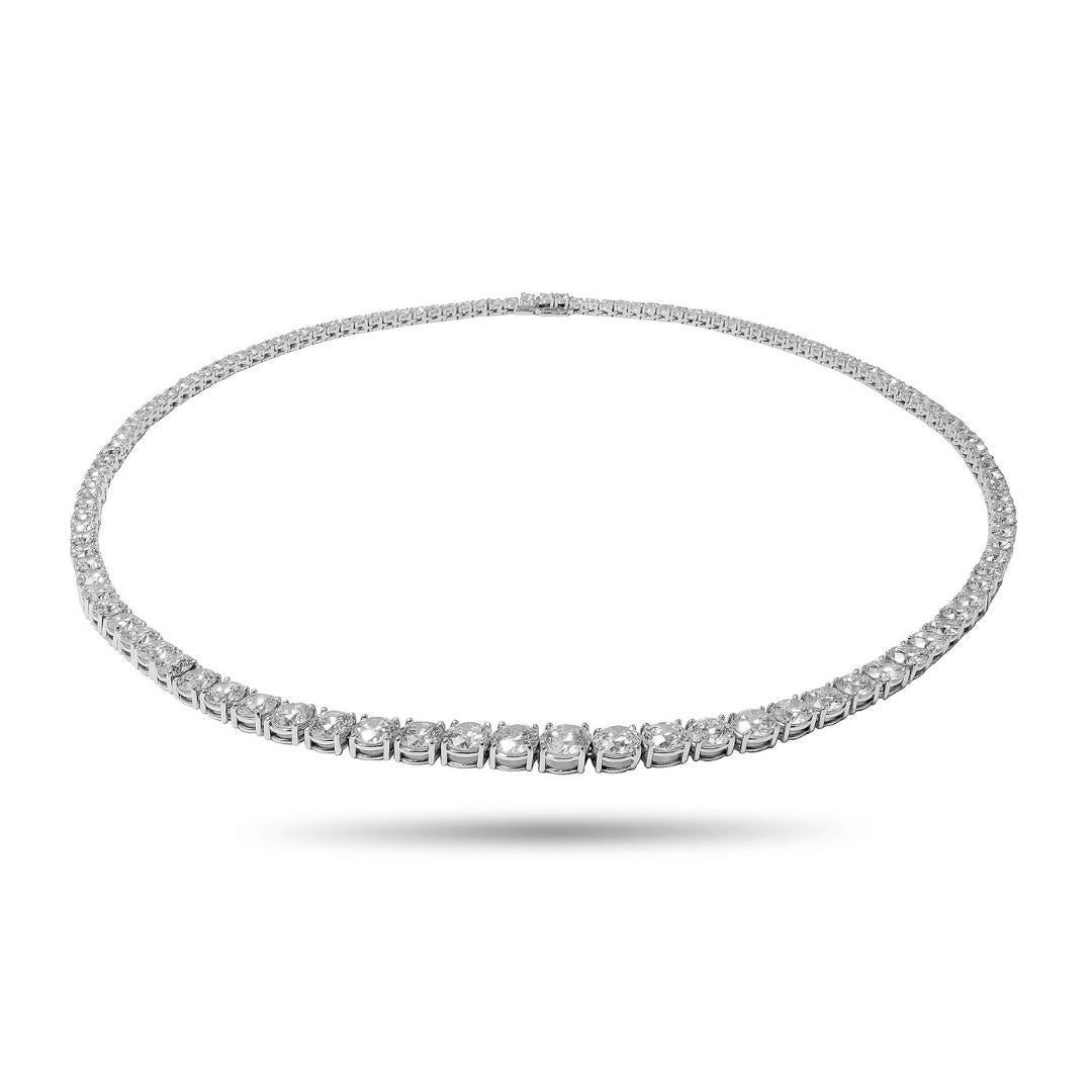 This alluring 17.00 carat set in 18k white gold graduated tennis necklace will impress everyone who sees it. Diamond tennis necklaces are trendy and very versatile and has withstood the test of time. You can wear them with a T-shirt or to a