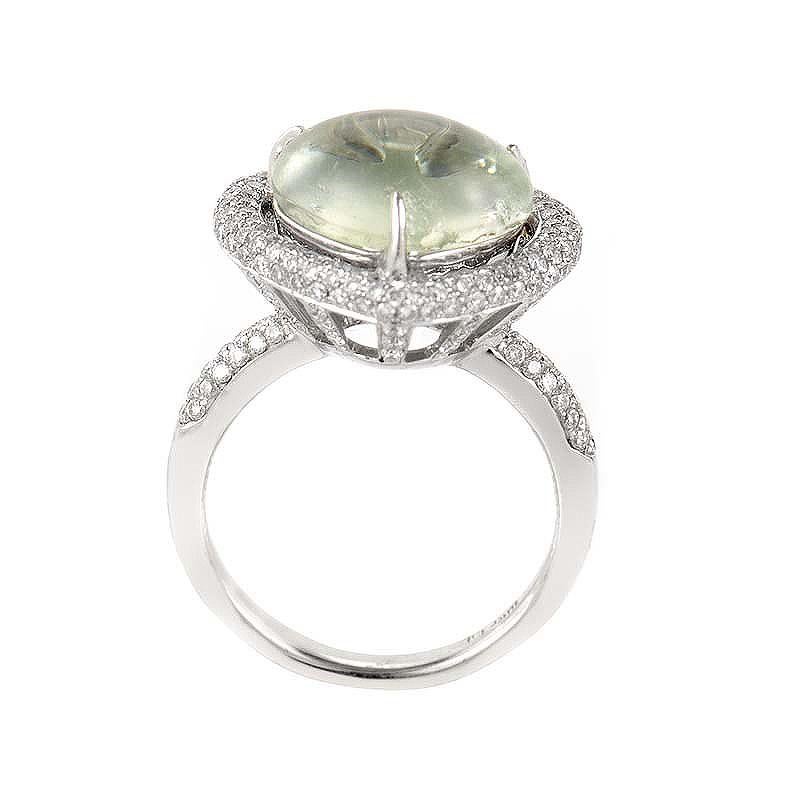 This ring is whimsical and sweet. It is made of 18K white gold and boasts a heart-shaped green amethyst cabochon. Lastly, the bezel and shanks are set with ~1.34ct of diamonds.
Ring Size: 7