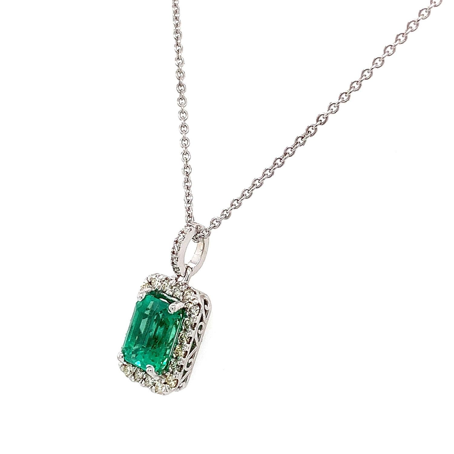 This stunning pendant features a 2.11 Carat Green Emerald with exceptional clarity and luster surrounded by a halo of diamonds in weight of 0.32 Carat. Experience the difference in person!

Product details: 

Center Gemstone Type: Emerald
Center