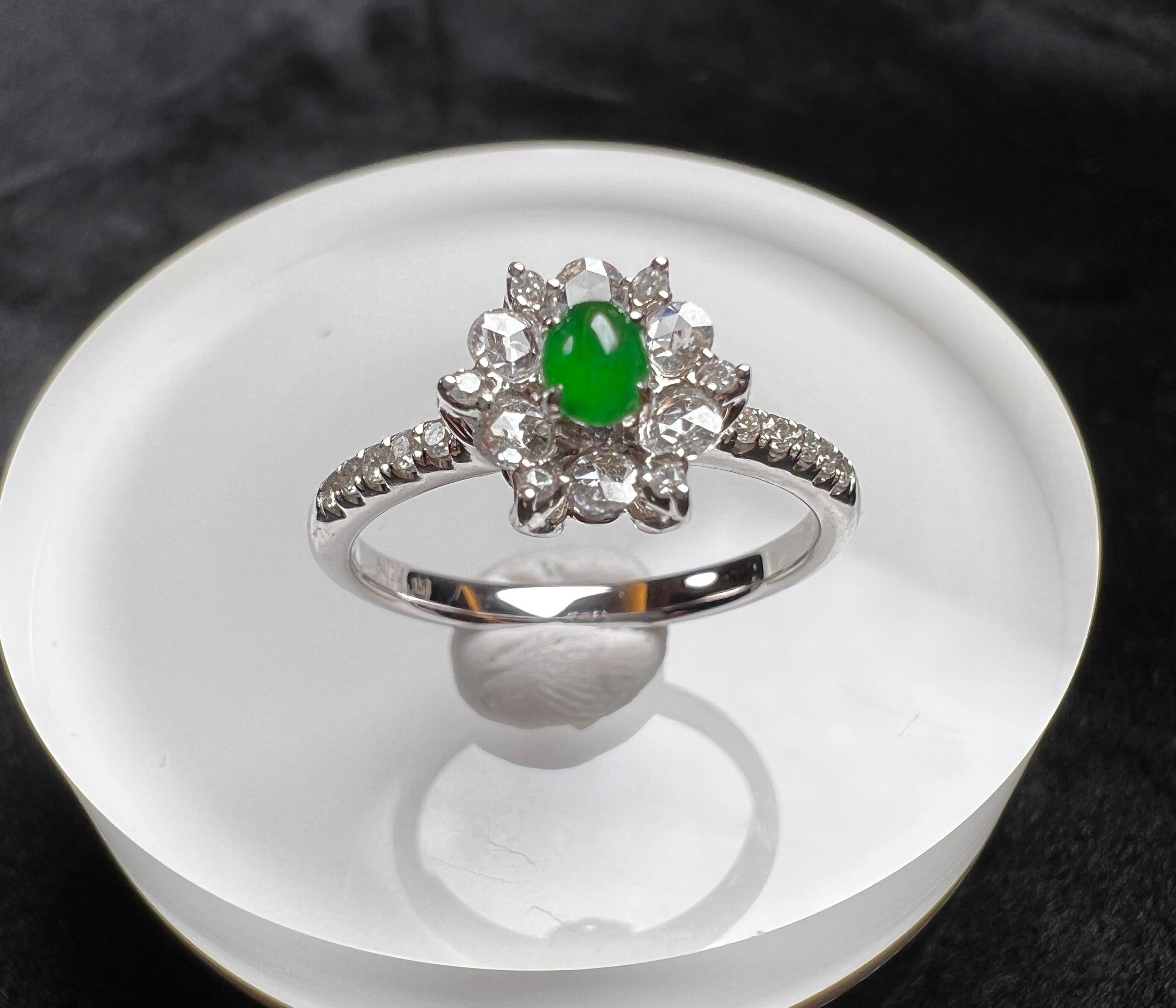 18K White Gold Green Jadeite Diamond Flower Cluster Ring Engagement Ring 

Size: O (UK) / 7.5 (US) 
Circumference (approx.): 55mm
Diameter (approx.): 17.5mm

Total weight (approx.): 3g
Centre setting measurement (approx.): 8.2*9.1mm 
Main stone