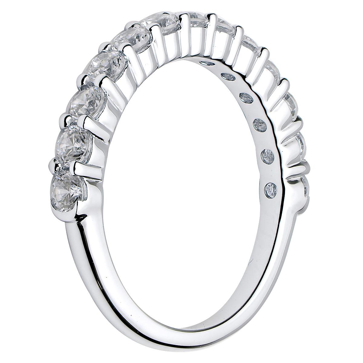 This beautiful 18 karat white gold diamond ring is made from 2.9 grams of gold. There are 13 round VS2, G color diamonds totaling 0.92 carats which are stunningly set with unique side prong details. This ring is size 7.