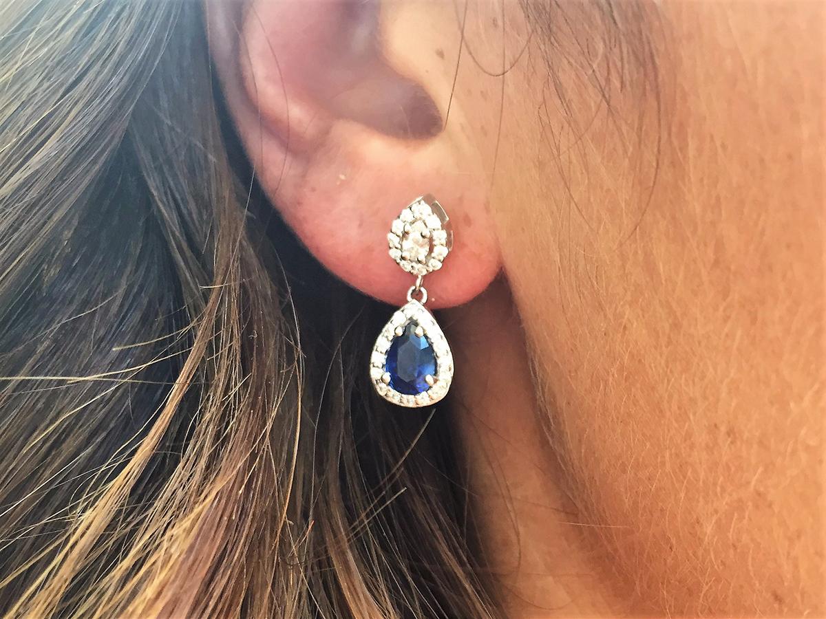 Contemporary 18k White Gold Halo Pear Shape Sapphire Diamond Drop Earrings