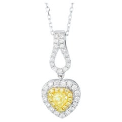 Collier pendentif en or blanc 18 carats avec diamant jaune taille cœur