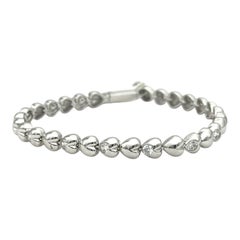 Bracciale tennis con maglie a forma di cuore in oro bianco 18 carati e diamanti - 2,25 CTW VS-G
