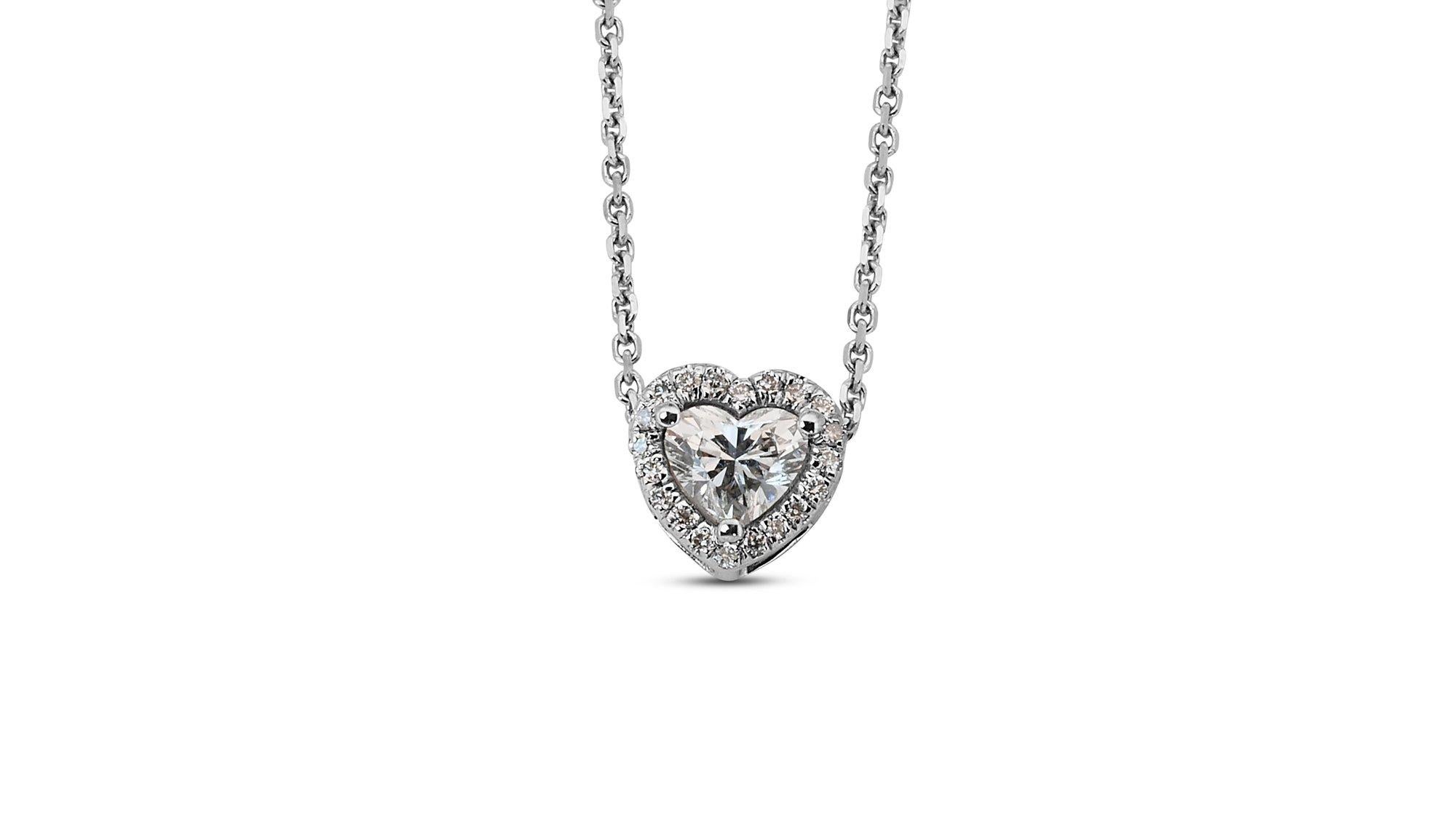 A beautiful halo heart necklace with pendant with a dazzling 0.30-carat heart shape natural diamond. It has 0.05 carat of side diamonds which add more to its elegance. The jewelry is made of 18K White Gold with a high-quality polish. It comes with a