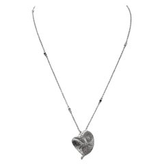 18k White Gold Heart Pendant with Diamonds and 15" Necklace.