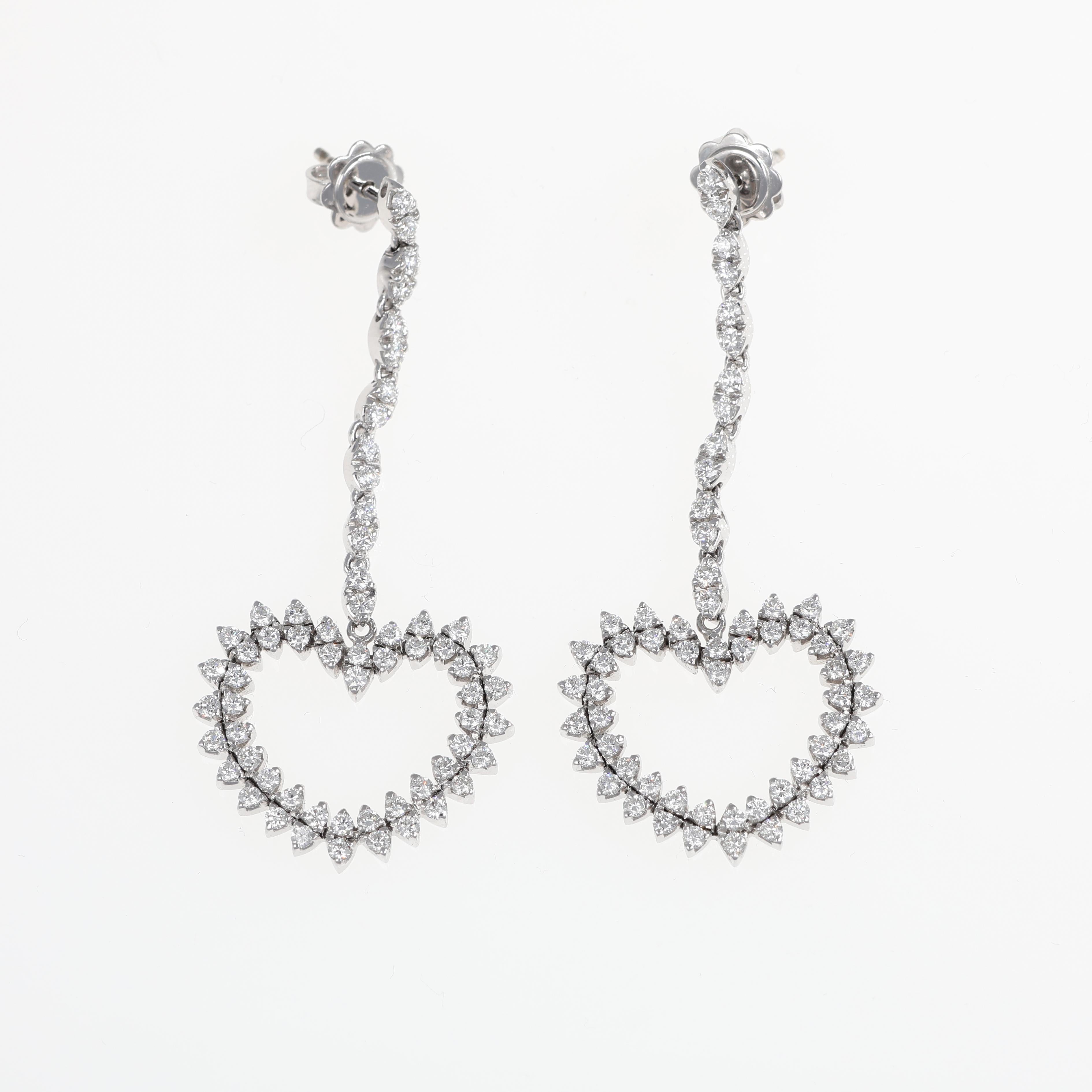 An elegant pair of drop earrings crafted in 18K white gold, featuring a delicate heart motif formed by brilliant-cut diamonds. The earrings are adorned with diamonds totaling 2.16 carats, offering a radiant sparkle that enhances their romantic