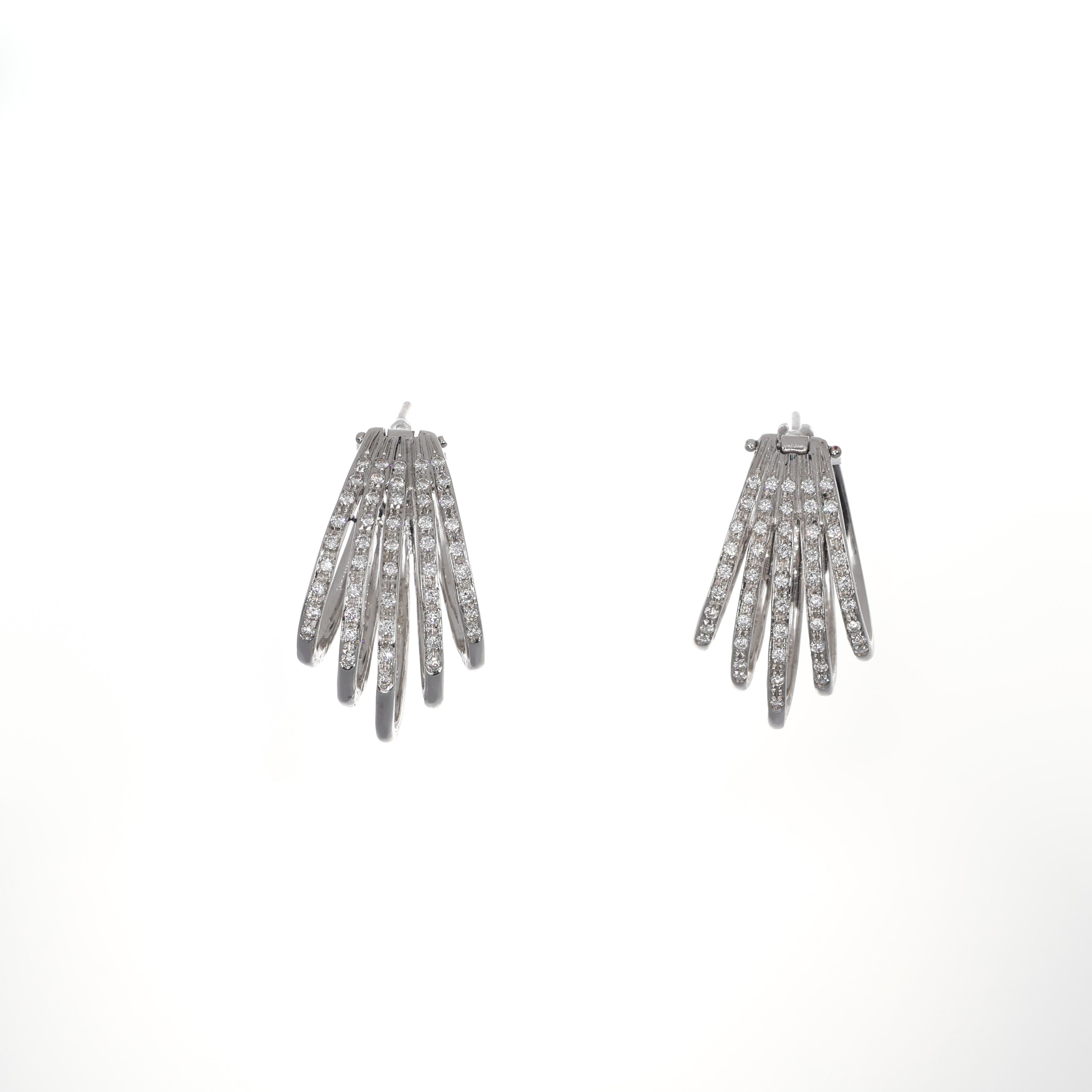 A contemporary interpretation of classic hoop earrings, this pair is crafted in 18K white gold with a dynamic, fan-like structure. The design features multiple diamond-set strands that radiate outward, creating movement and brilliance. The pavé-set