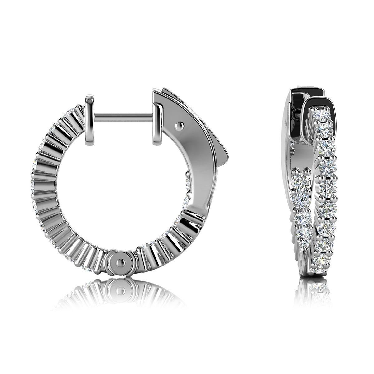 This hoop earring features round brilliant diamonds micro-prong set. The diamonds are set throughout the earrings outside and on the inner side. Its 2/3 of an inch in diameter. Experience the difference!

Product details: 

Center Gemstone Color: