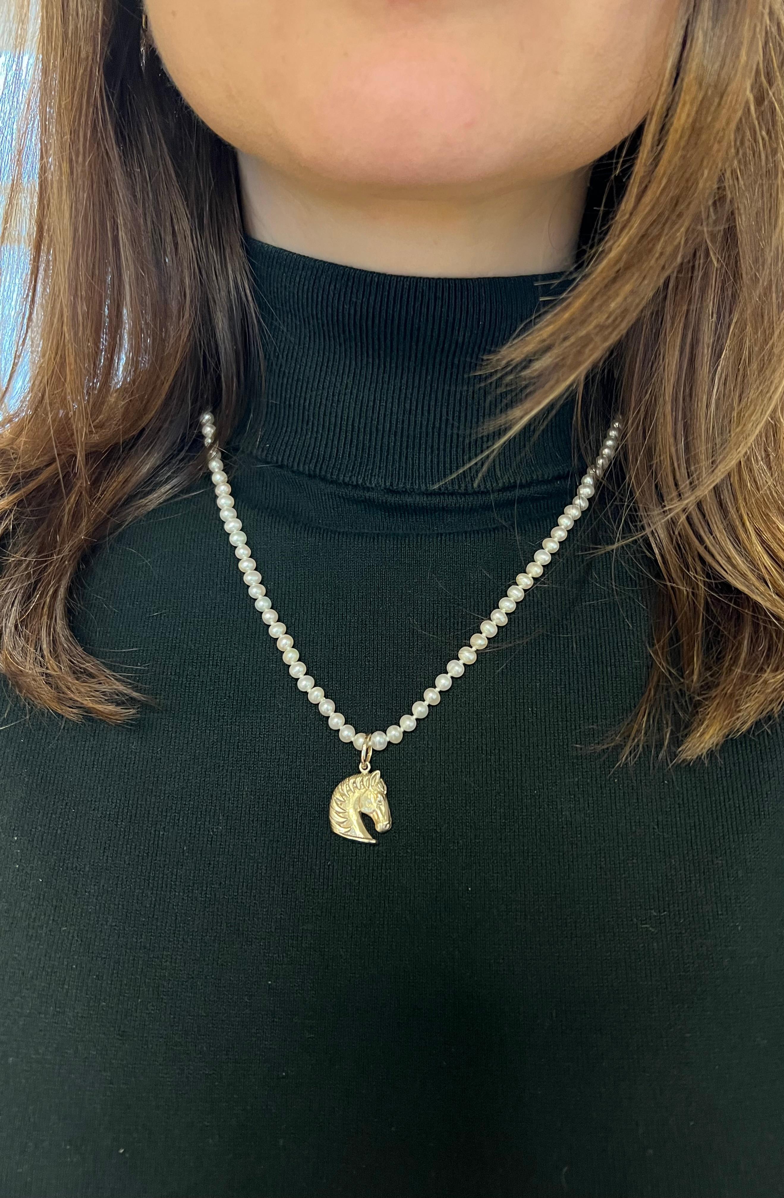 Embrace the spirit of elegance and grace with our 18k White Gold Horse Pendant, a captivating piece that exudes timeless charm. Crafted with precision and passion, this pendant showcases the silhouette of a majestic horse, a symbol of strength,