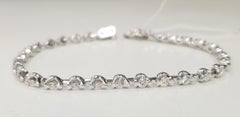 18k White Gold Illusion Tennis Setting to Make a Diamond Look Larger 2.03cts.