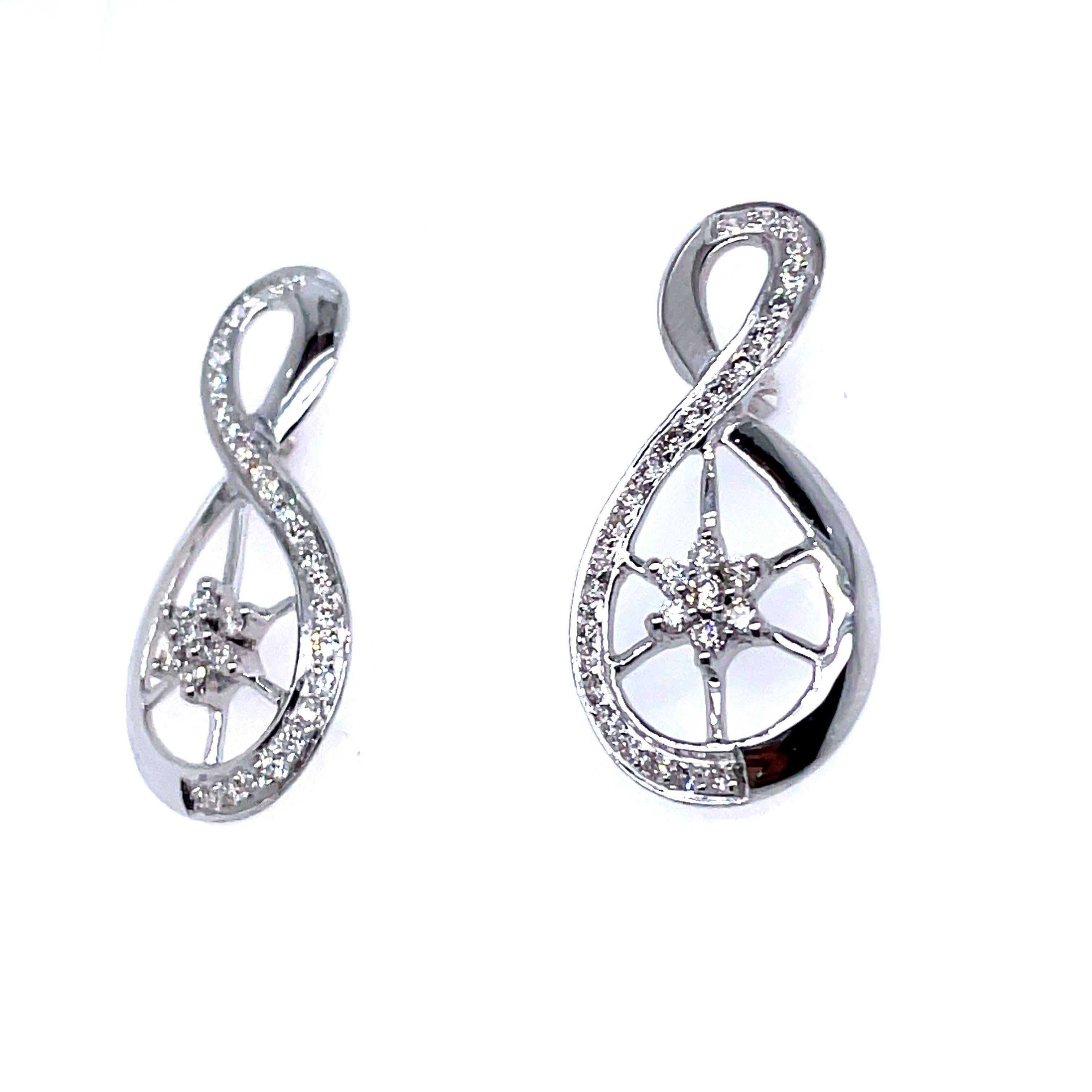 Contemporary 18k White Gold Infinity Diamond Earrings For Sale
