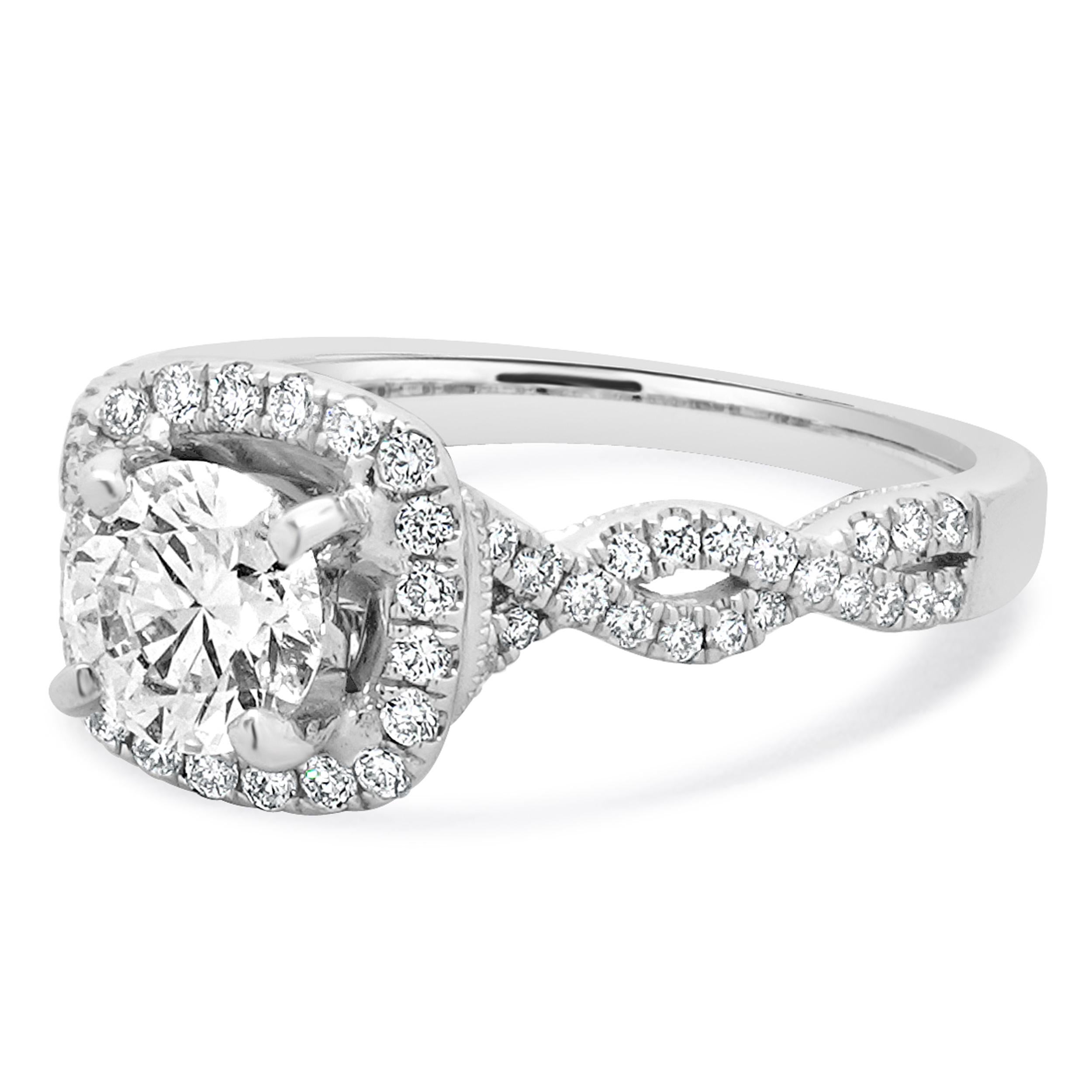 Material: 18k white gold
Center Diamond: 1 round cut = 0.70ct
Color: H
Clarity: SI1
Diamonds: 74 round cut= 0.36cttw
Color: G
Clarity: SI1
Ring Size: 5.5 (please allow up to 2 additional business days for sizing requests)
Dimensions: ring top