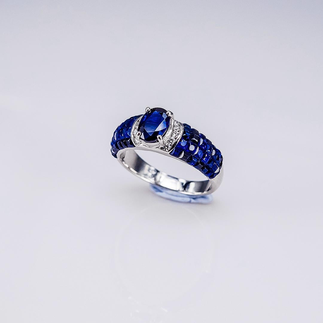 A very nice oval sapphire ring use the top quality Sapphire which make in invisible setting.We set the stone in perfection as we are professional in this kind of setting more than 40 years.The invisible is a highly technique .We cut and groove every