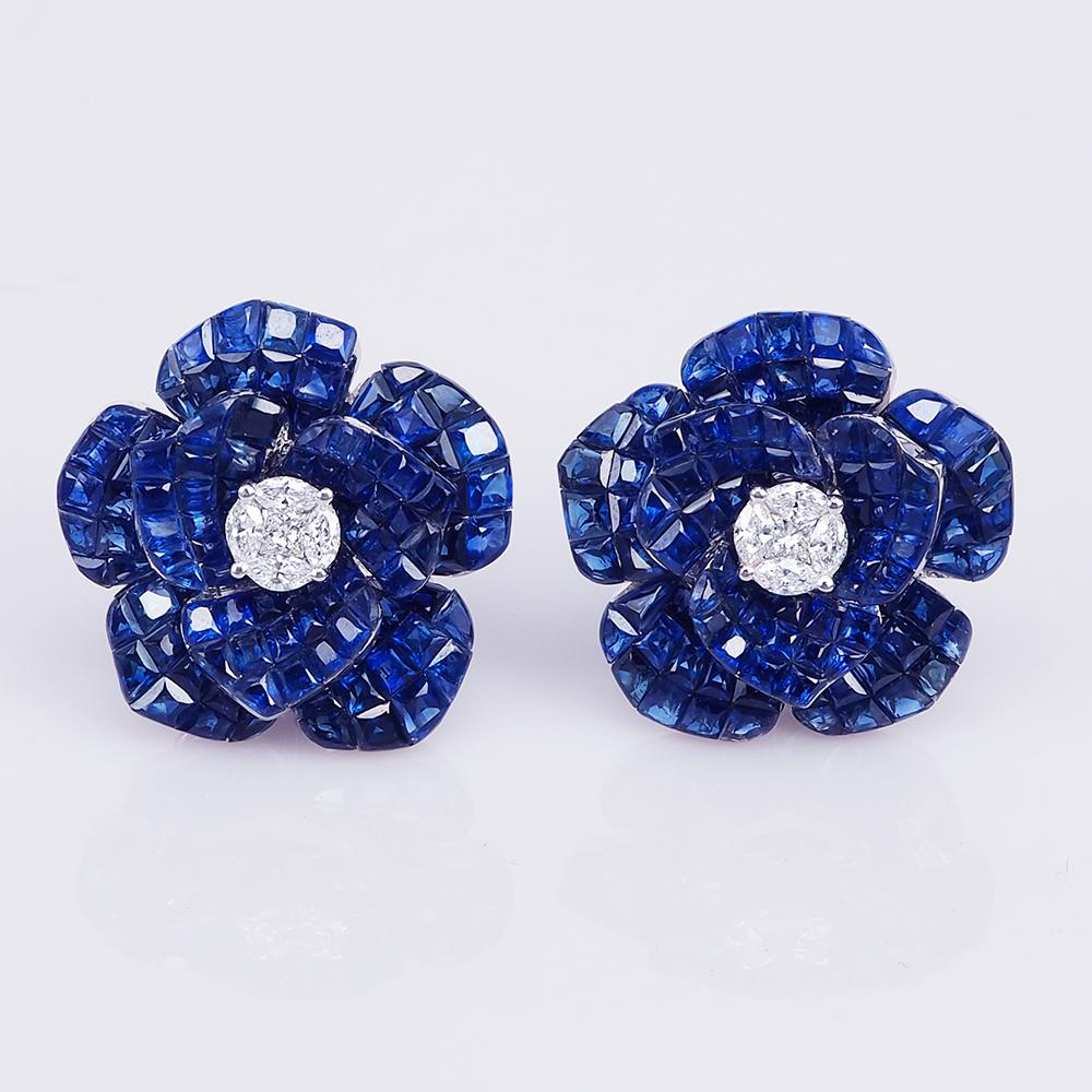 Sapphire invisible Rose Earrings uses the top quality Sapphire which make in invisible setting. We set the stone in perfection as we are professional in this kind of setting more than 40 years. The invisible is a highly technique .We cut and groove