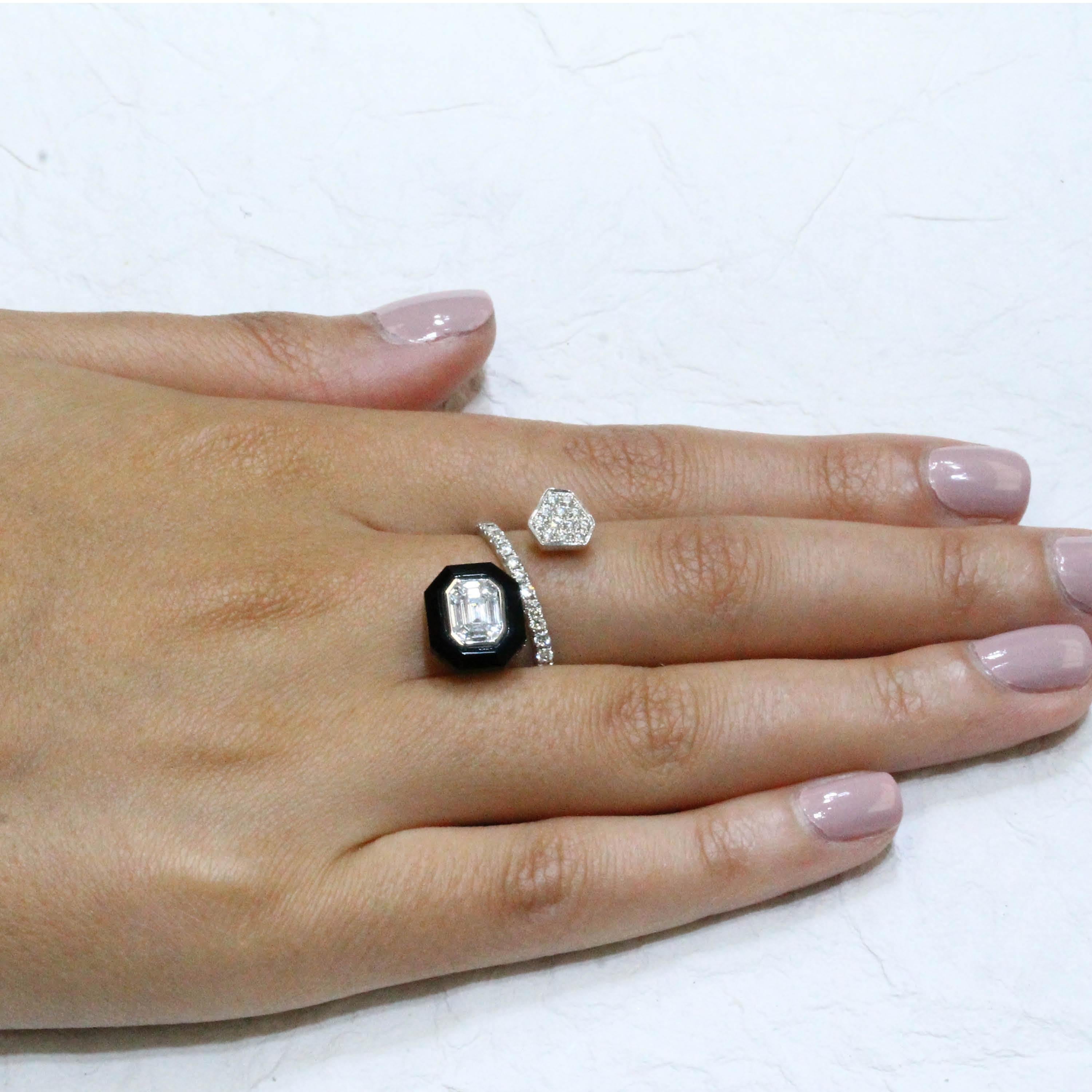 Mondrian Ring featuring an Invisible-Set Emerald Diamond Center made up of Baguettes, framed in Black Onyx, in an 18K White Gold Bypass setting. Finger size 6.5 - different sizes available upon request/quote. The art works of Piet Mondrian inspire