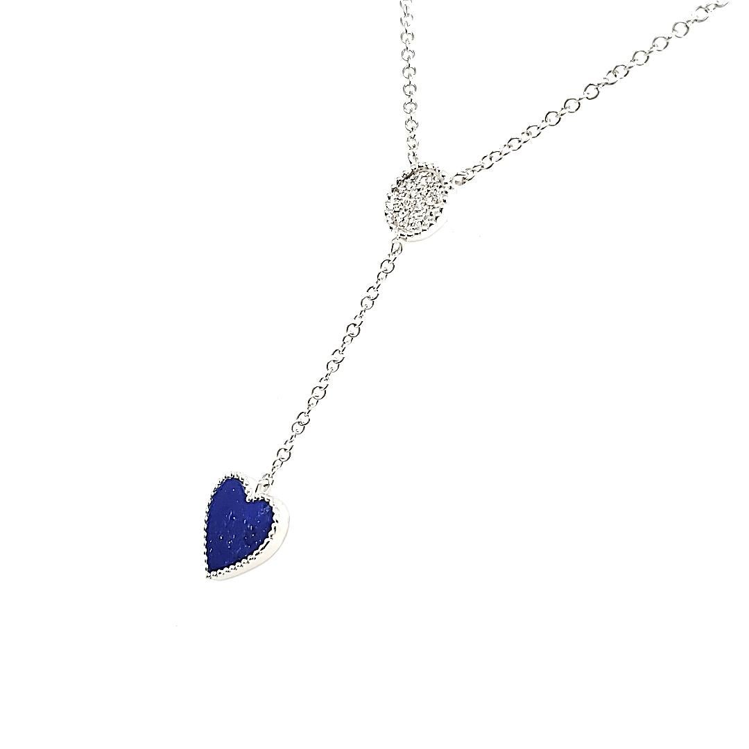 Feel the warmth of affection as you adorn yourself with the 0.59 cts heart-shaped lapis lazuli gemstone sourced from Afghanistan and the shimmering brilliance of 19 round diamonds.

All set in 18K white gold, weighing 2.24 grams.

Lapis lazuli was