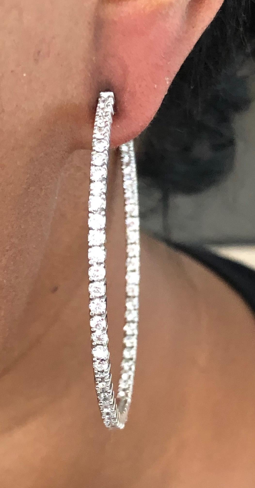 Every woman loves a large pair of Diamond Hoop Earrings, these here are 2 inches in diameter, made in 18K White Gold, set with 120 round Diamonds 4.00 carats.
Earring diameter: 2 inches ( 5.1 CM )

We design and manufacture our jewelry in New York