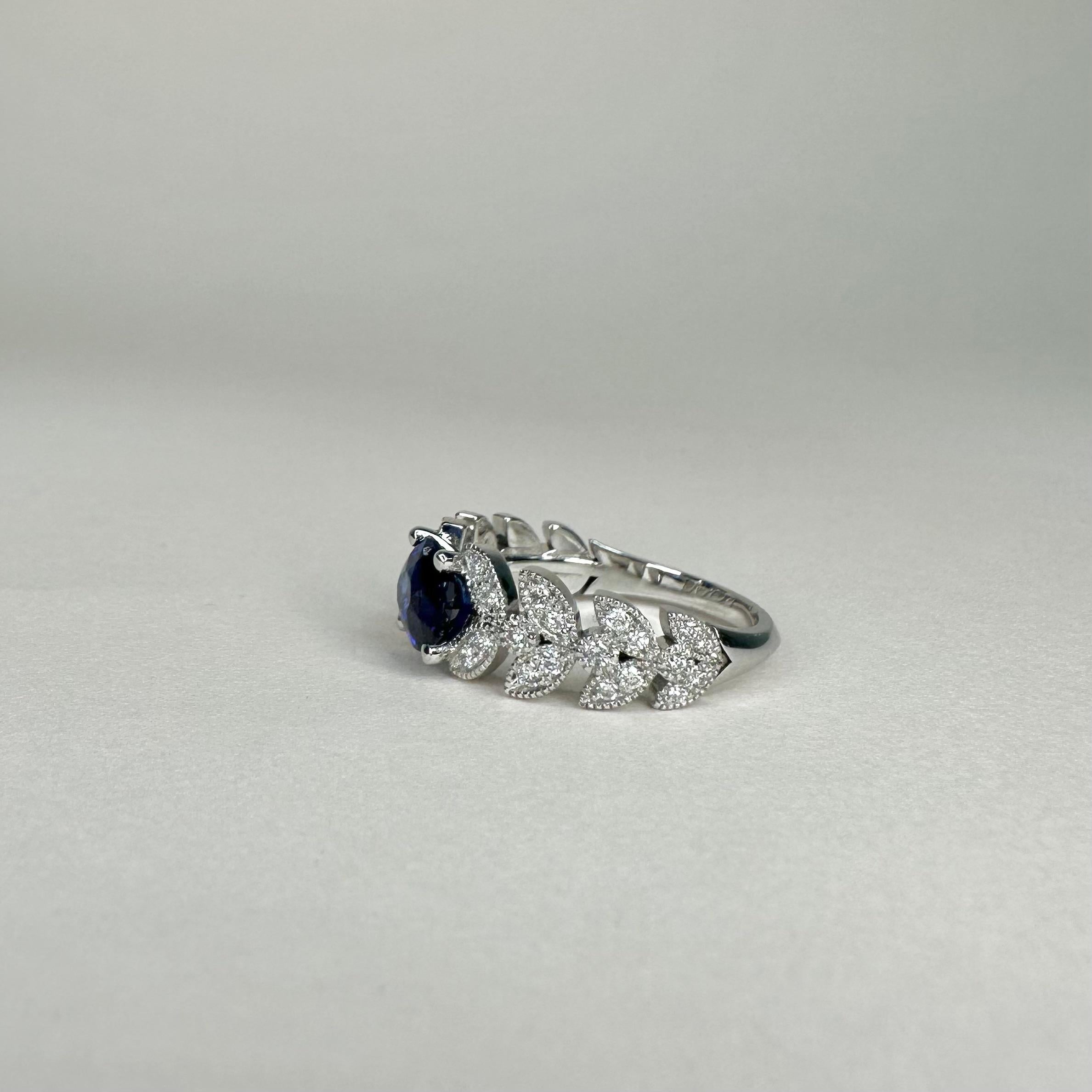 For Sale:  18k White Gold Laurel Leaf Design Ring Set with 1.53 Ct Royal Blue Oval Sapphire 4