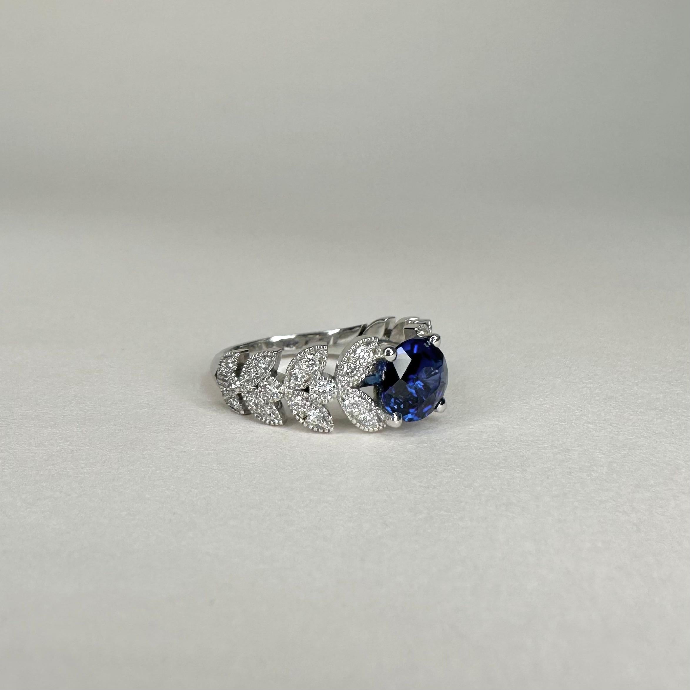 For Sale:  18k White Gold Laurel Leaf Design Ring Set with 1.53 Ct Royal Blue Oval Sapphire 5