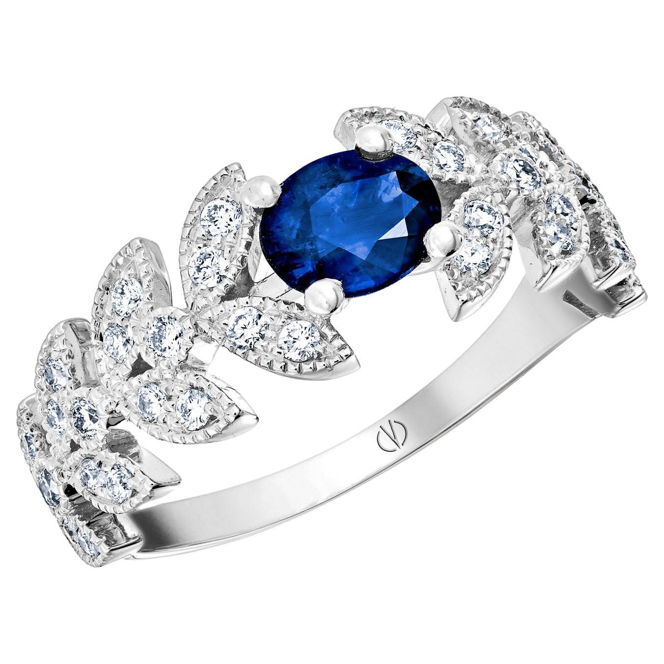 For Sale:  18k White Gold Laurel Leaf Design Ring Set with 1.53 Ct Royal Blue Oval Sapphire