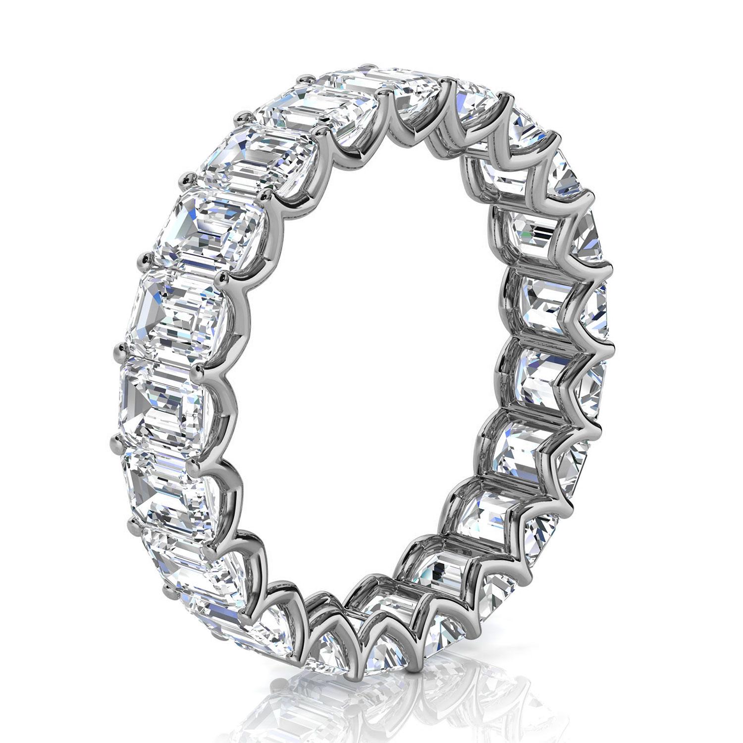 This Elegant Eternity Ring showcase matched 21 Emerald shape Natural Diamonds in an approximate total weight of 4. carat set in floating 