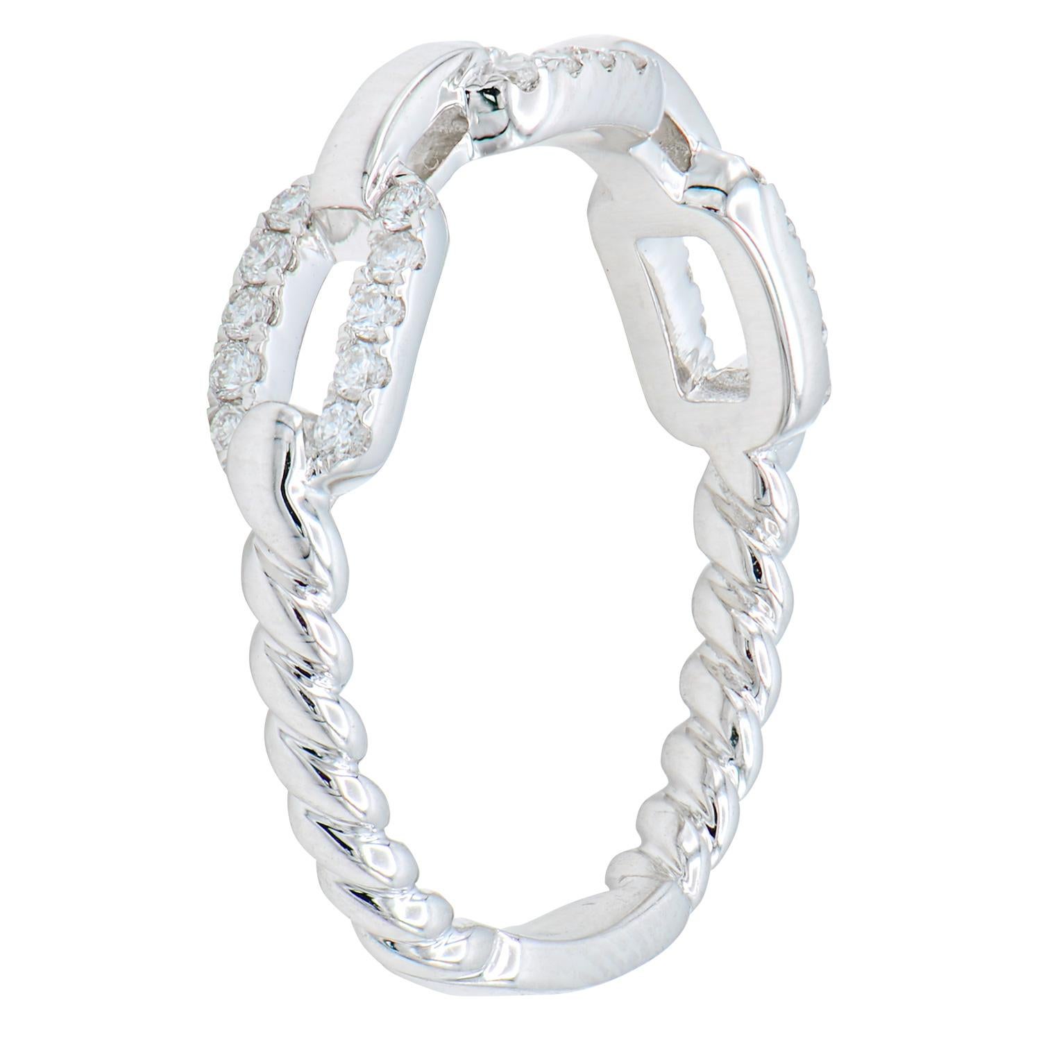 This modern, fun ring is made from 2.9 grams of 18 karat white gold. The back of the ring features a twist-like effect and the front features a chain-link design. The ring contains 30 round VS2, G color diamonds totaling 0.23 carats. This ring is