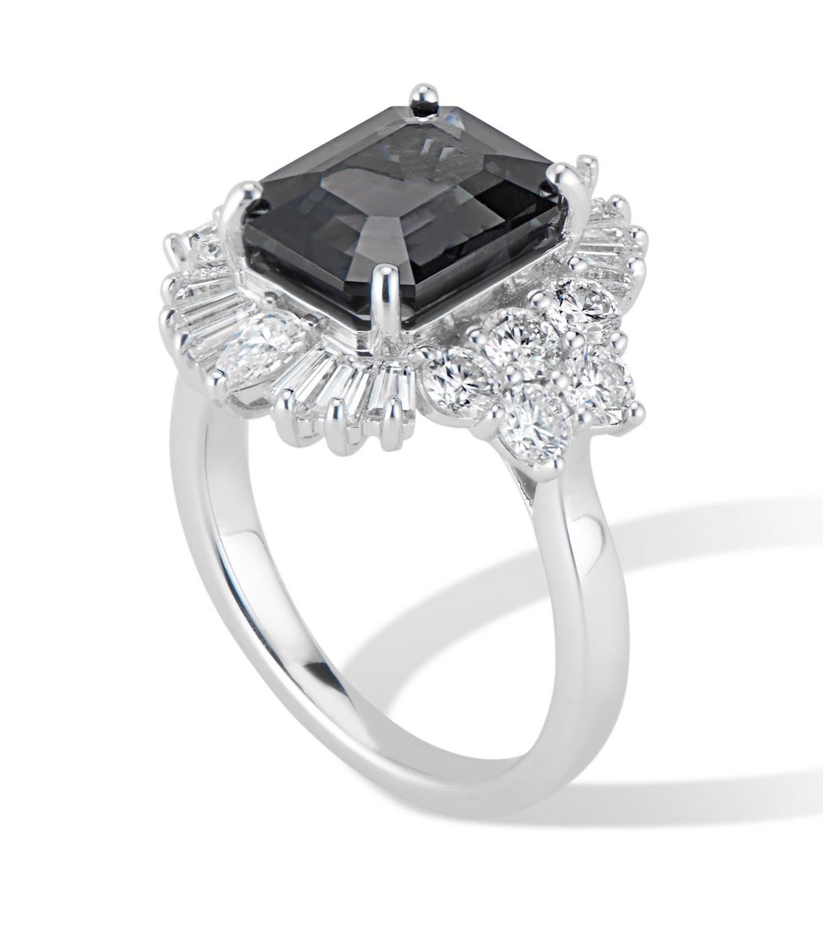 Turn heads with this breathtaking Art Deco-inspired masterpiece. At its heart lies a GIA-certified, natural, untreated 4.22 ct black Spinel, exuding depth and allure. This striking centerpiece is encircled by an impressive combination of 1.6 ct