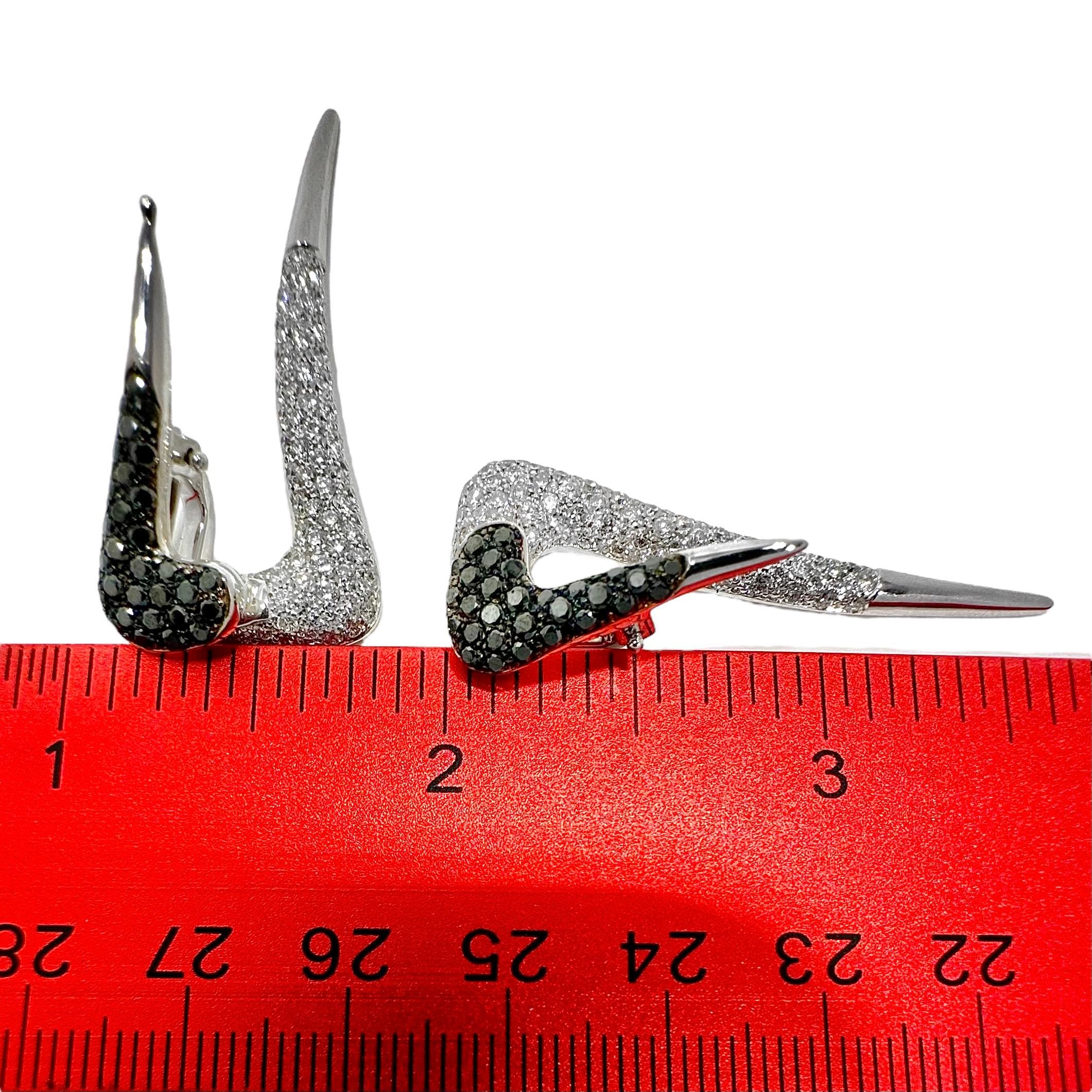 Modern 18k White Gold Long Icicle Earrings Encrusted with Black & White Diamonds  For Sale