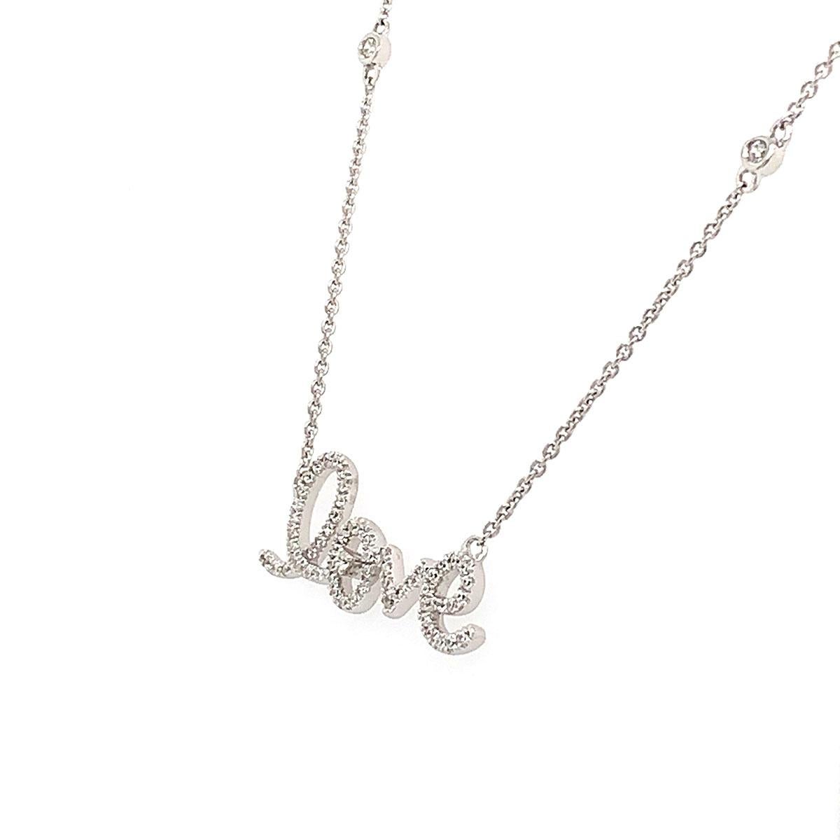 This elegant necklace features four(4) evenly spread brilliant diamonds bezel set on a delicate chain connecting to a Love diamond pendant Micro-Prong -Set. An ideal gift for birthday, valentine, or graduation. Experience the difference in