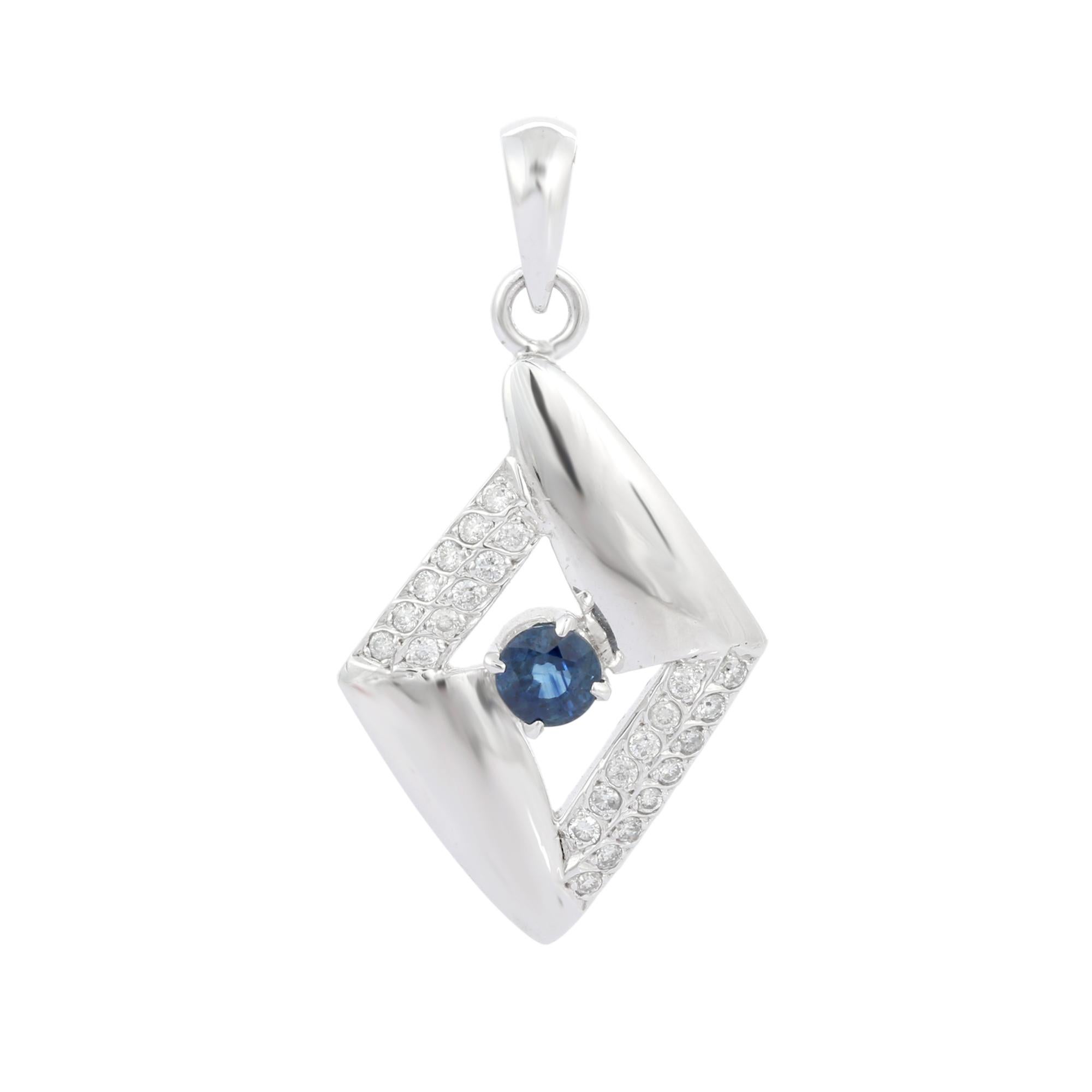Natural Blue Sapphire pendant in 18K Gold. It has a round cut sapphire studded with diamonds that completes your look with a decent touch. Pendants are used to wear or gifted to represent love and promises. It's an attractive jewelry piece that goes