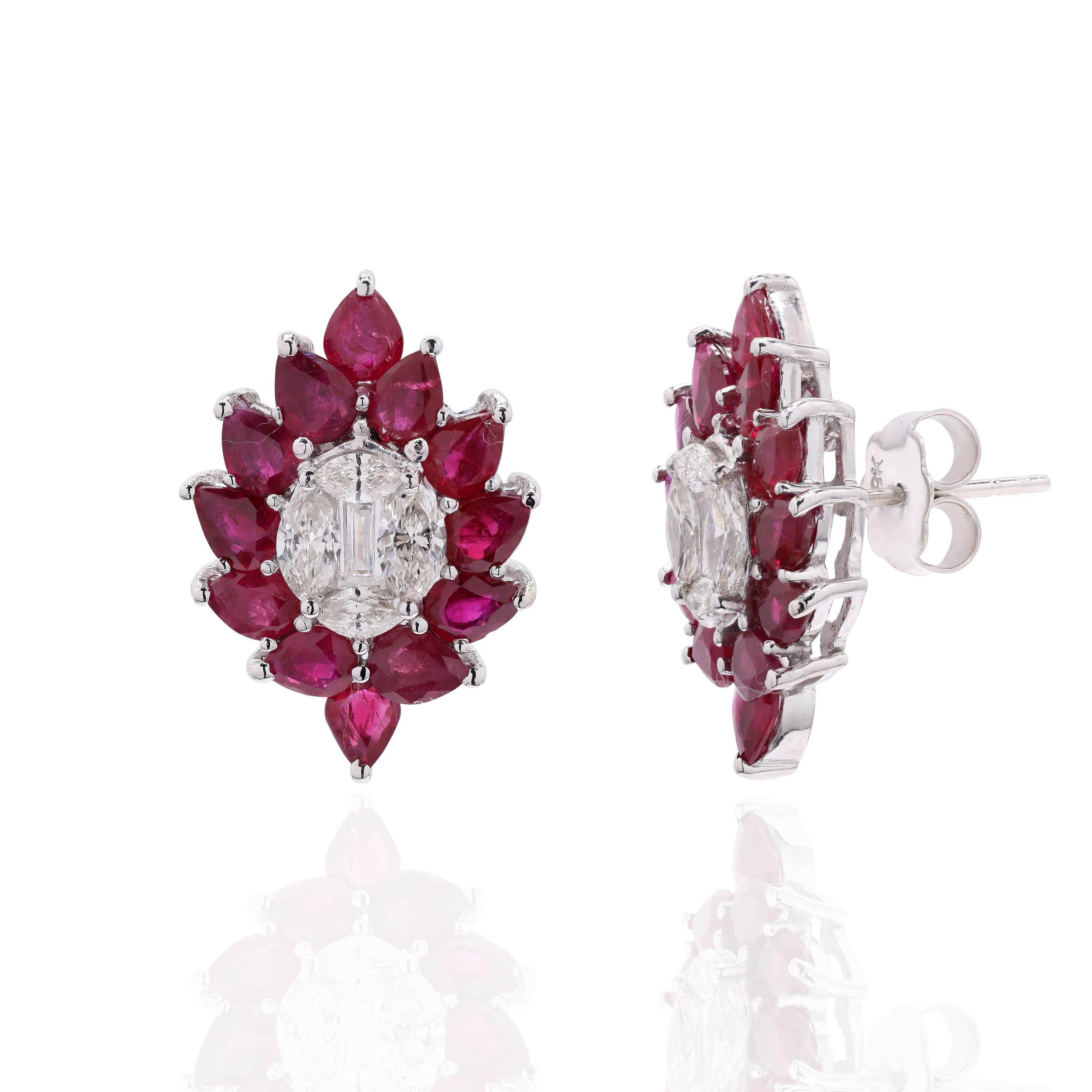 Earrings create a subtle beauty while showcasing the colors of the natural precious gemstones and illuminating diamonds making a statement.
Pear cut ruby and diamond statement earrings in 18K gold. Embrace your look with these stunning pair of