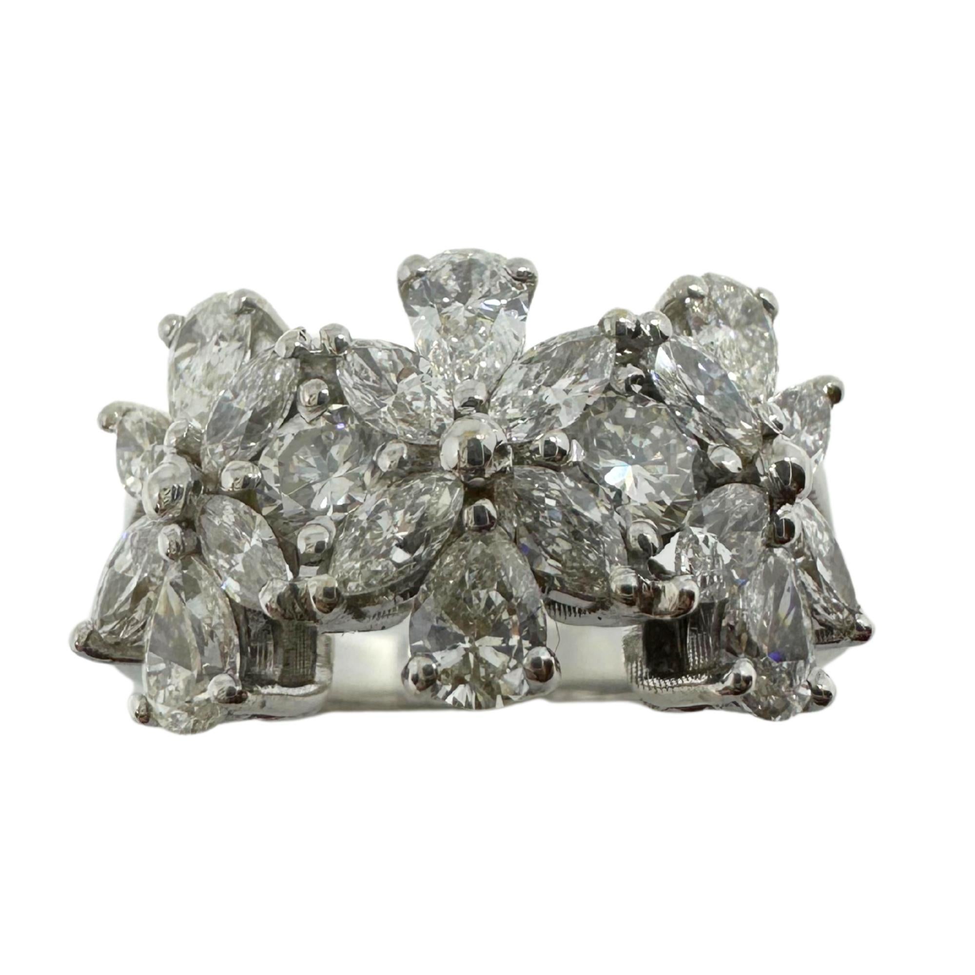 18K White Gold Marquise and Pear Cut Diamond Band Ring
Condition: In good condition with some minor surface wear consistent with age.
Ring size: 7.25
Width: 11.1 mm
Metal: 18k White Gold
Weight: 7.1 grams
Diamonds: 2.05 carats