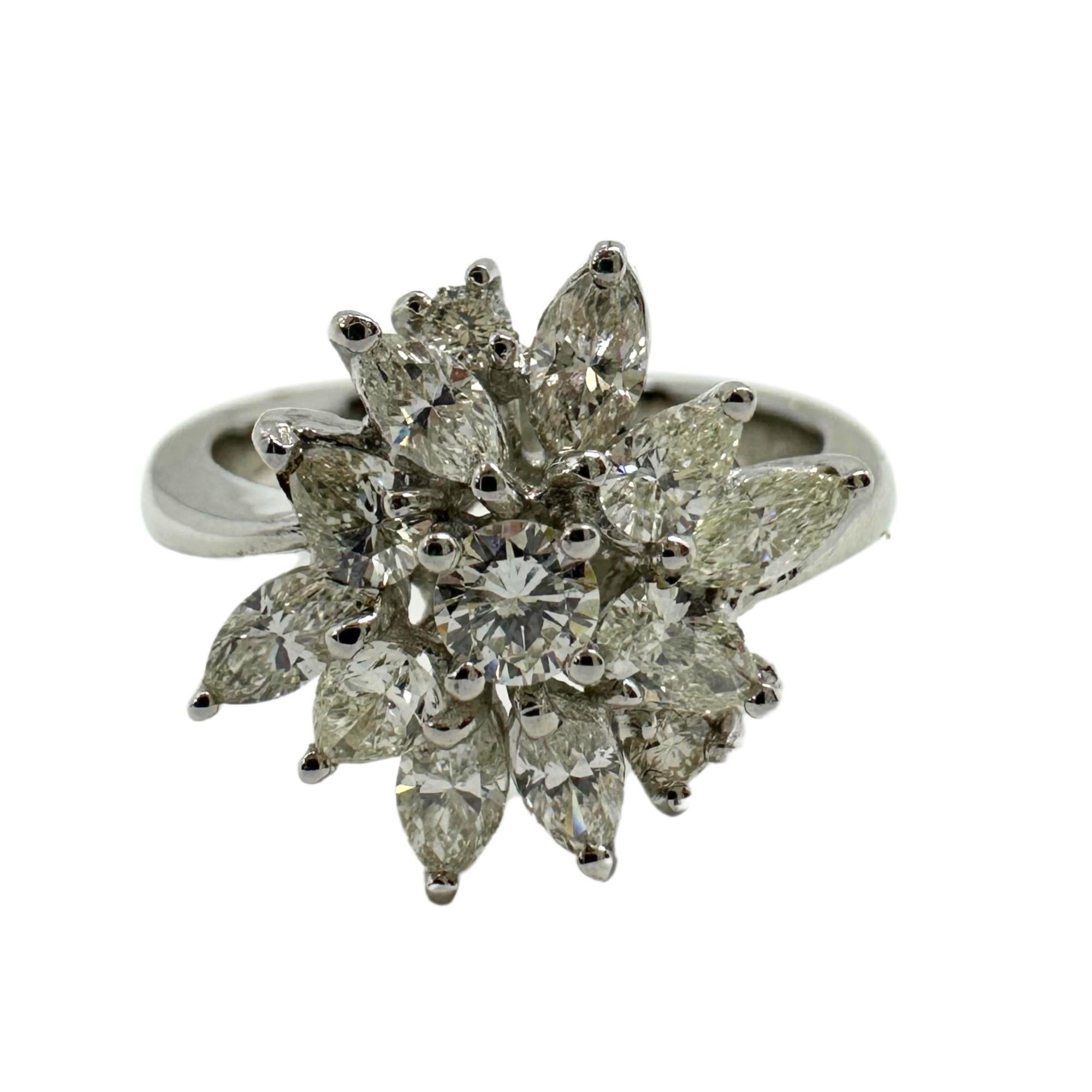 Exude elegance with our 18k Marquise and Princess Cut Diamond Ring. Crafted in 18k white gold with a weight of 5.58 grams, this ring features a stunning combination of 0.57 carats of marquise cut diamonds, 0.36 carats of pear cut diamonds, and 0.19