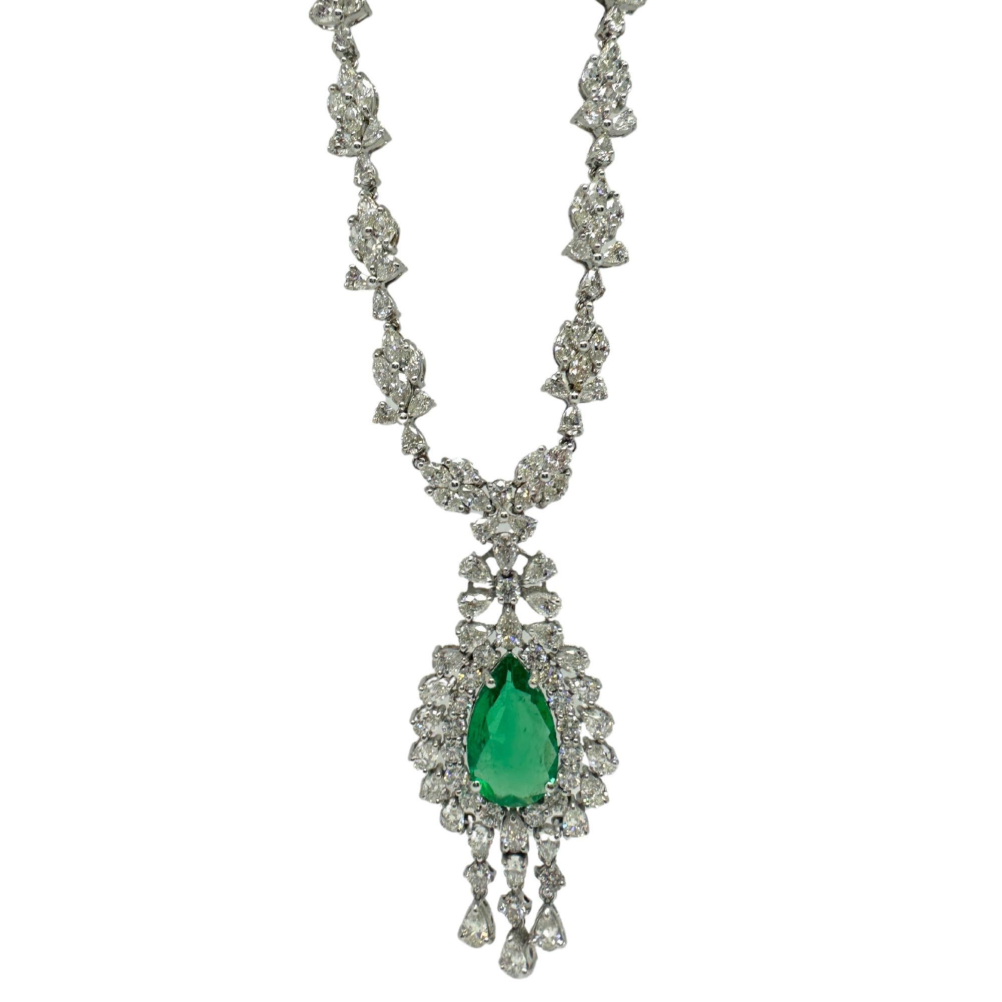 18K White Gold Marquise and Pearl Cut Diamond and Pear Cut Emerald Drop Necklace
Condition: In good condition with some minor surface wear consistent with age.
Length: 16 inch chain, 2 inch pendant
Markings: “T1365
Metal: 18k White Gold
Weight: 27.7