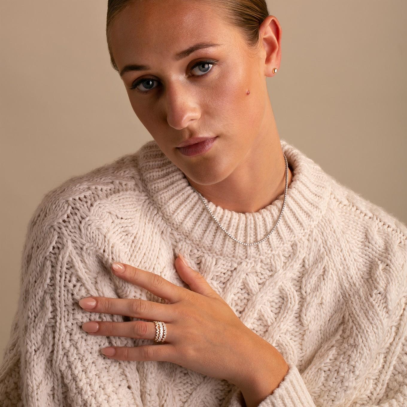 Elevate your jewelry collection with our exquisite 18K Gold Marquise and Round Diamond Band, a timeless design that embodies understated luxury and elegance.

Crafted in radiant 18K gold, this band features a harmonious blend of marquise and round