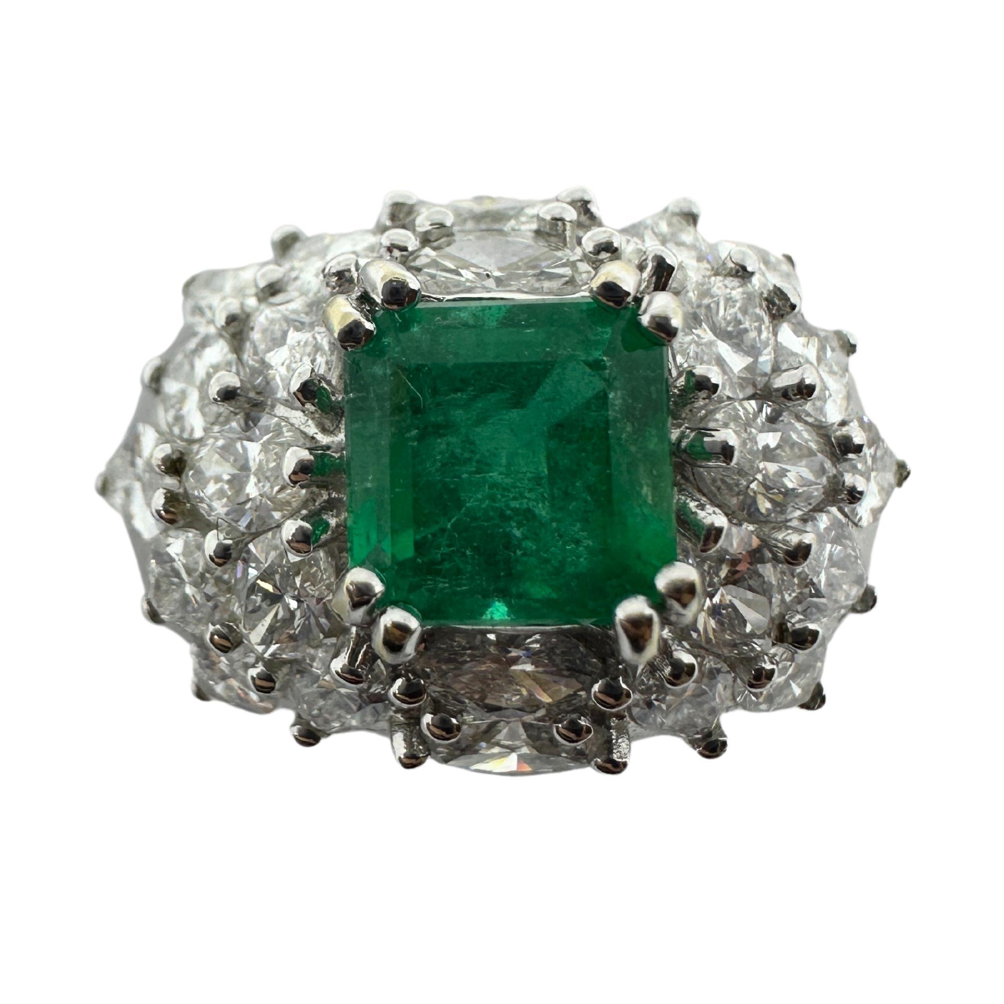 Modern 18k White Gold Marquise Cut Diamond and Emerald Ring For Sale