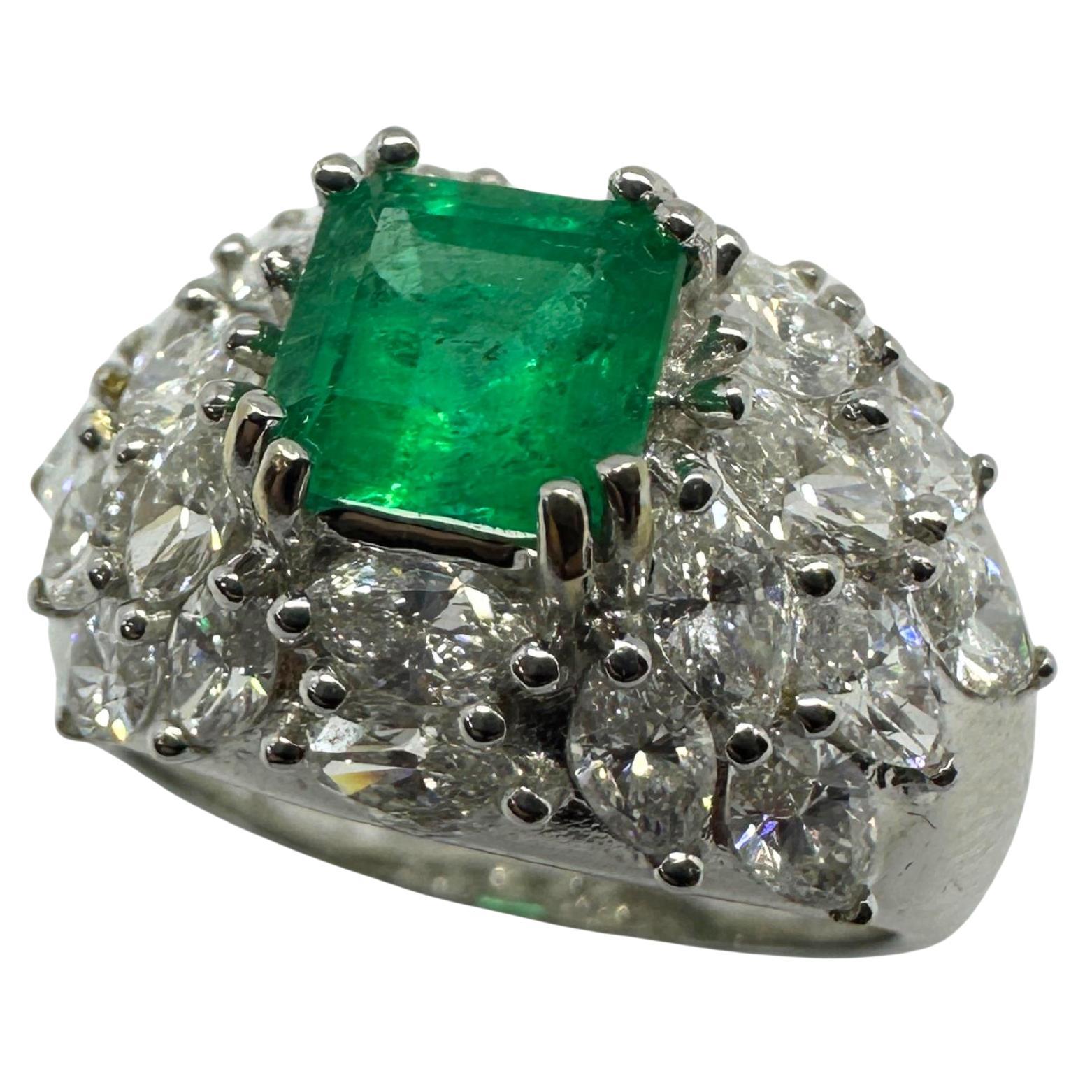 18k White Gold Marquise Cut Diamond and Emerald Ring