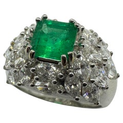 18k White Gold Marquise Cut Diamond and Emerald Ring
