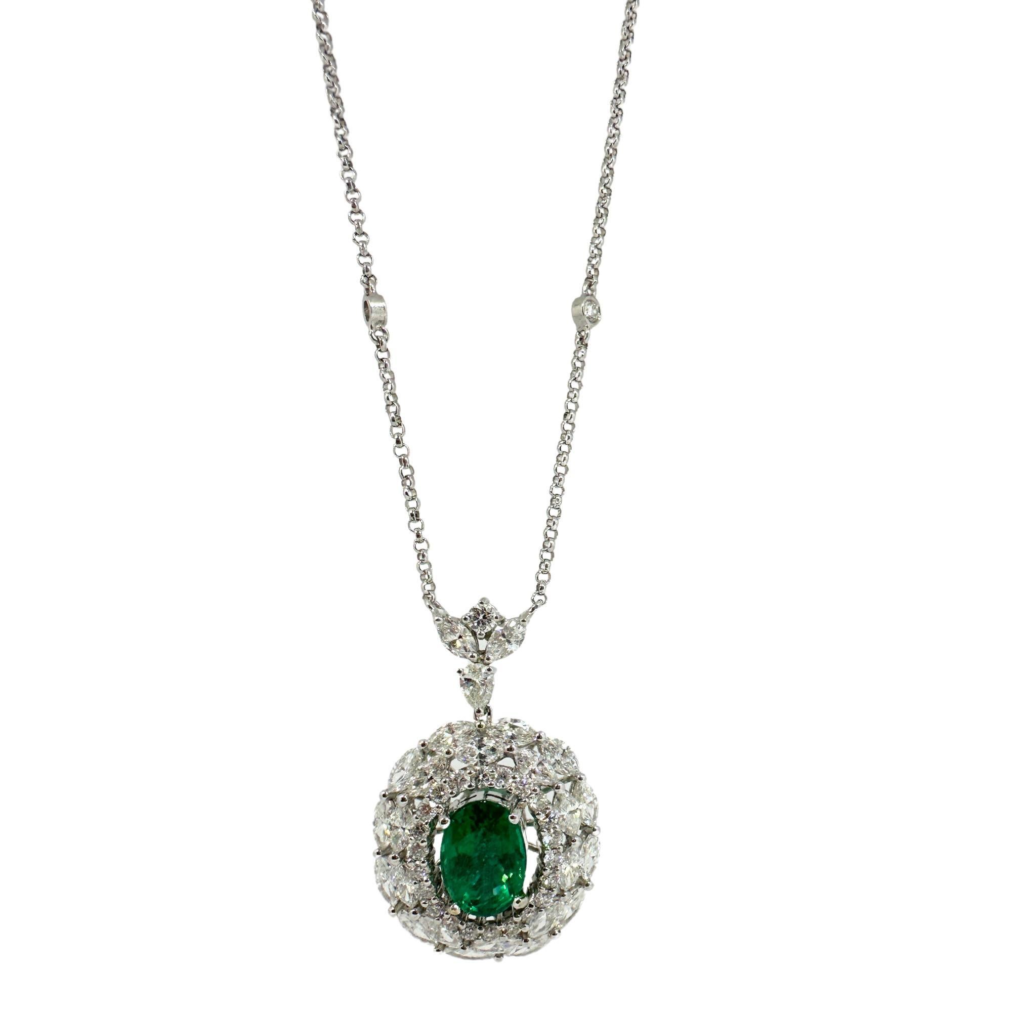 18K White Gold Marquise Cut Diamond and Oval Emerald Necklace
Condition: In good condition with some minor surface wear consistent with age.
Length: 16 inch chain, 1.20 inch pendant
Markings: 