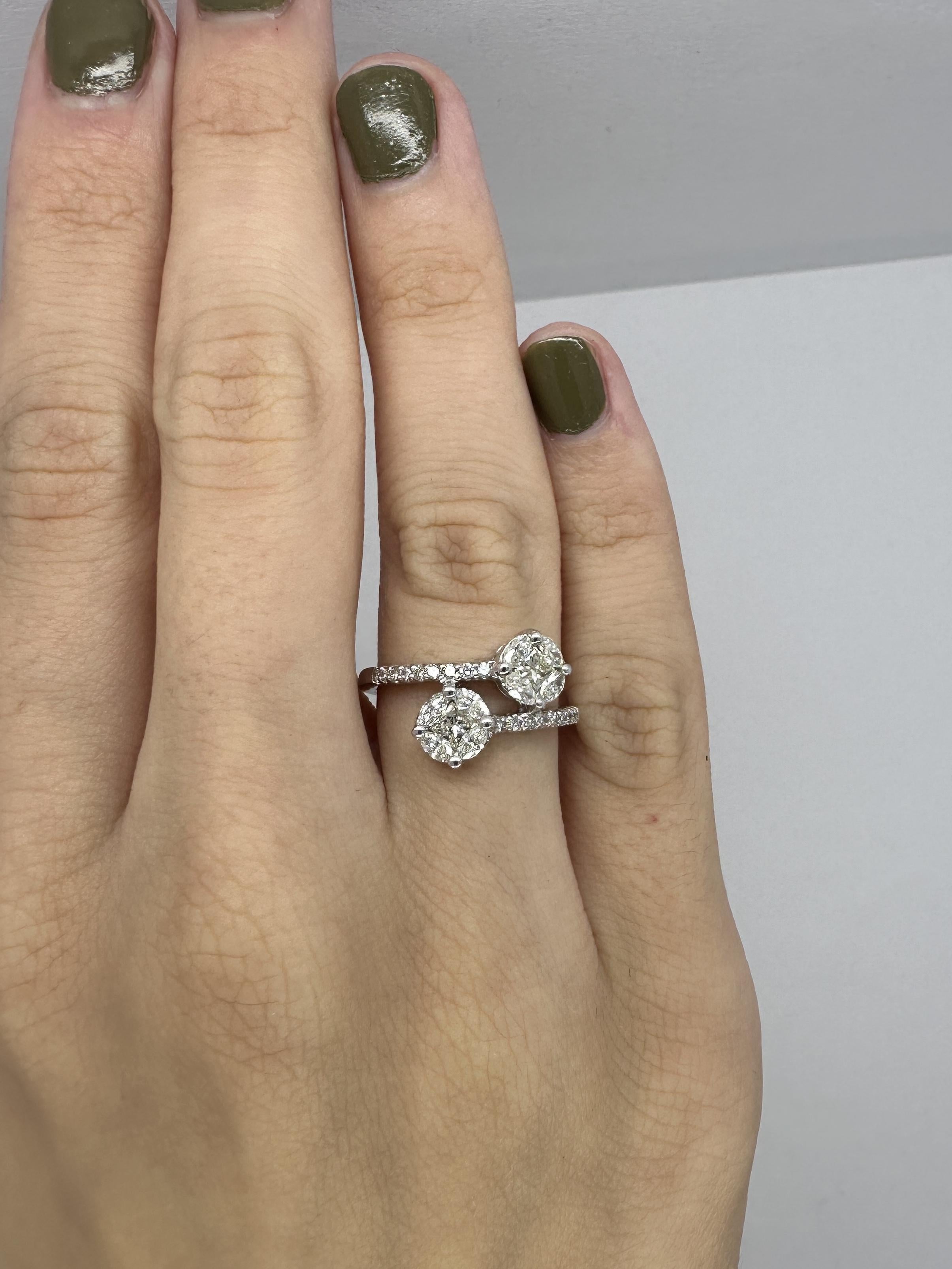 Captivating and elegant, our 18k Diamond Bypass Ring weighs a delicate 3.4 grams and is designed in a size 6. The shimmering diamonds, totaling 0.88 carats, add a touch of brilliance to this timeless piece. 

18k Diamond Bypass Ring
Condition: In