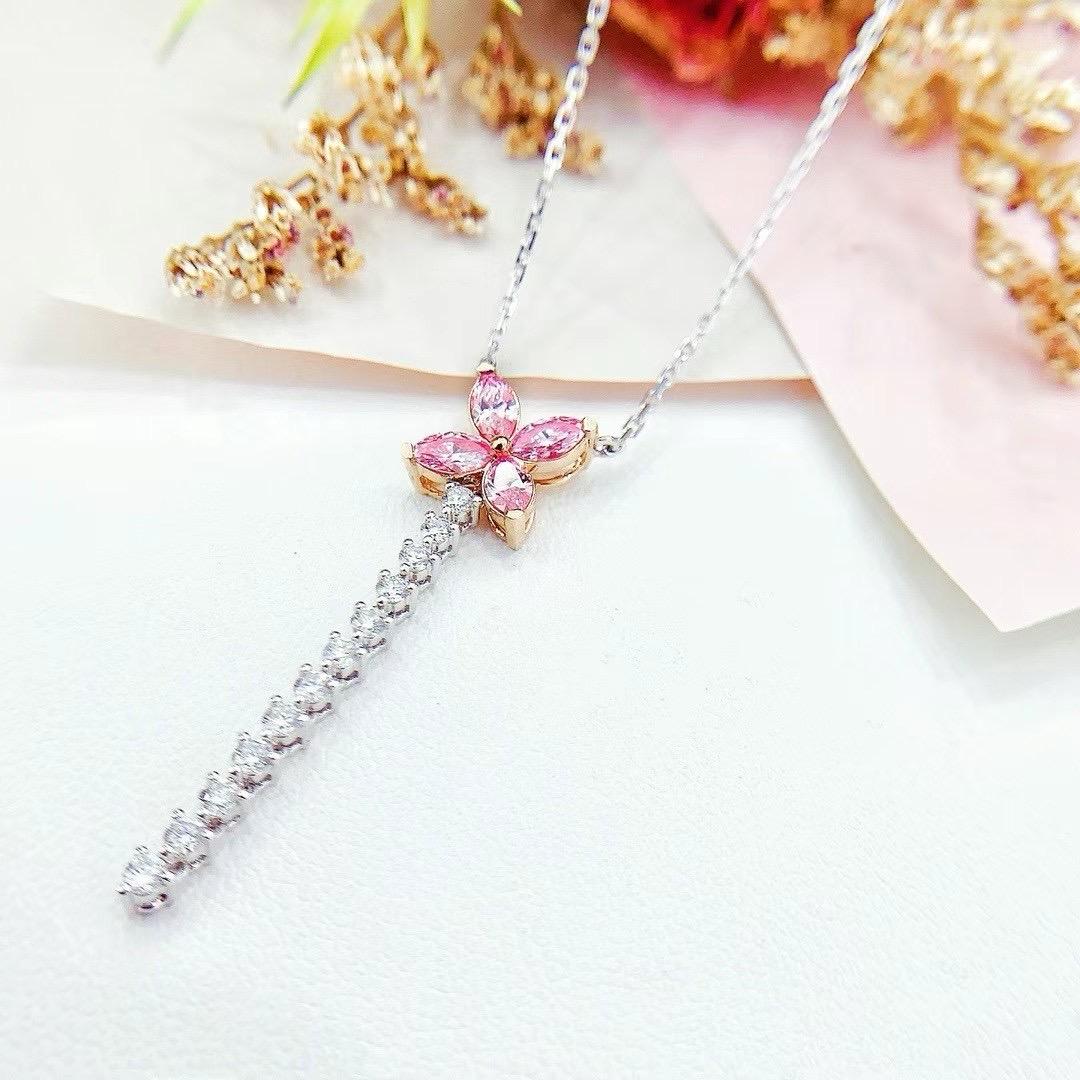 18K White Gold Marquise-Cut Fancy Pink Diamond & Diamond Pendant Necklace

4 Pink Diamonds - 0.55 CT
Diamonds - 0.32 CT
Total Weight - 3.59 GM

This exquisite 18K white gold pendant necklace features a stunning marquise-cut fancy pink diamond,