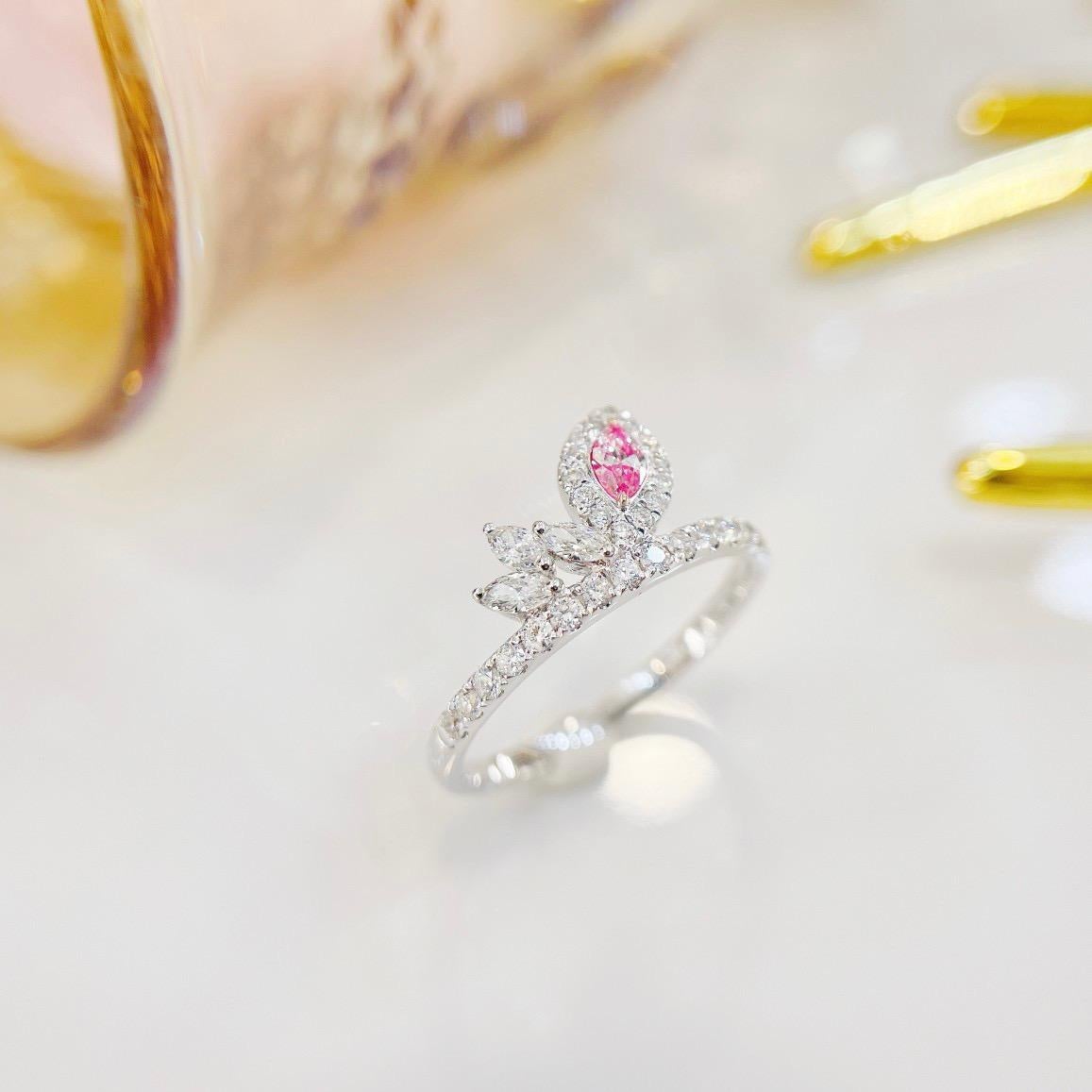 18K White Gold Marquise-Cut Fancy Pink Diamond Ring 

1 Pink Diamond - 0.09 CT
Diamonds - 0.34 CT

Total Weight - 1.87 GM