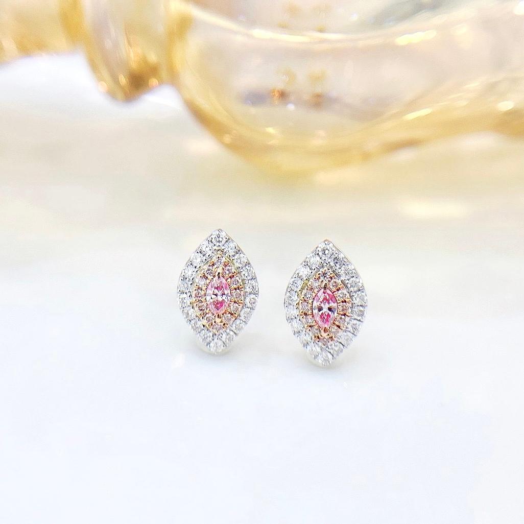 18K White Gold Marquise-Cut Fancy Pink Diamond Stud Earrings

2 Fancy Pink Diamonds - 0.24 CT
Diamonds - 0.38 CT
18K White Gold - 2.25 CT

The pink diamond is a captivating and rare gemstone, its hue evoking the most delicate and precious things in
